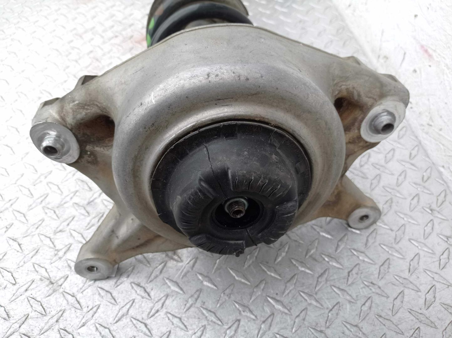 Амортизатор передний левый