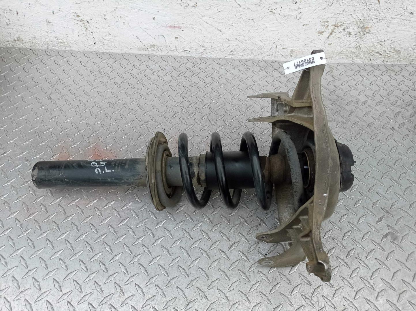 Амортизатор передний левый