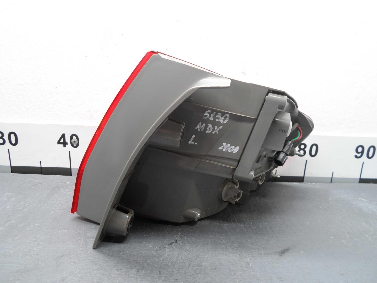 Фонарь задний наружный левый