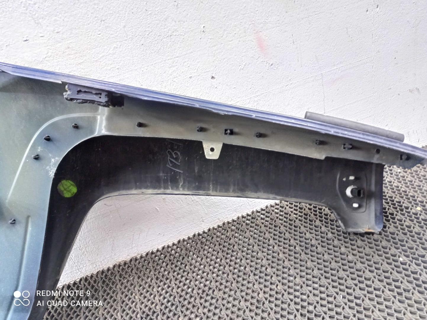 Накладка переднего крыла левого