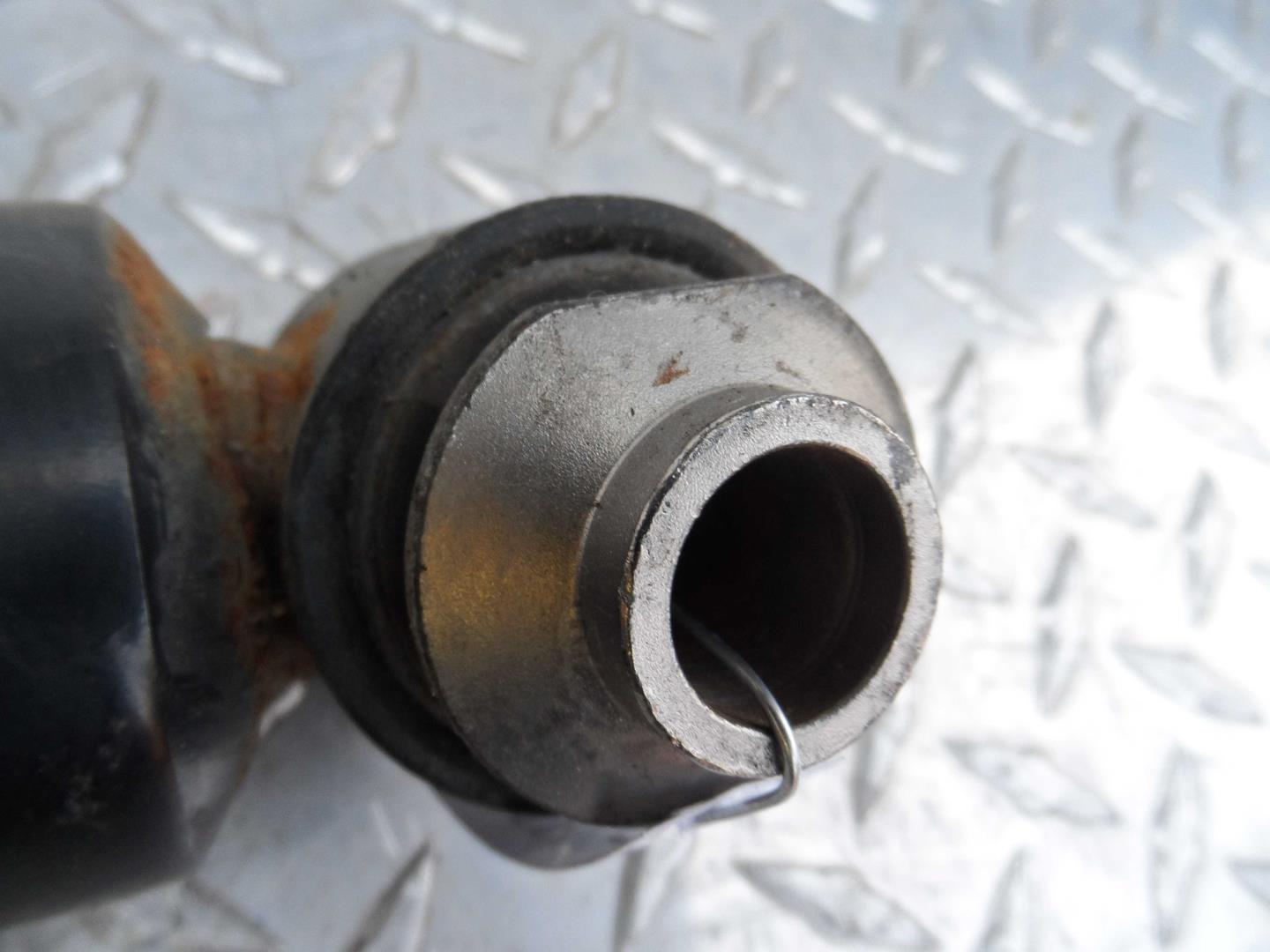 Амортизатор задний левый