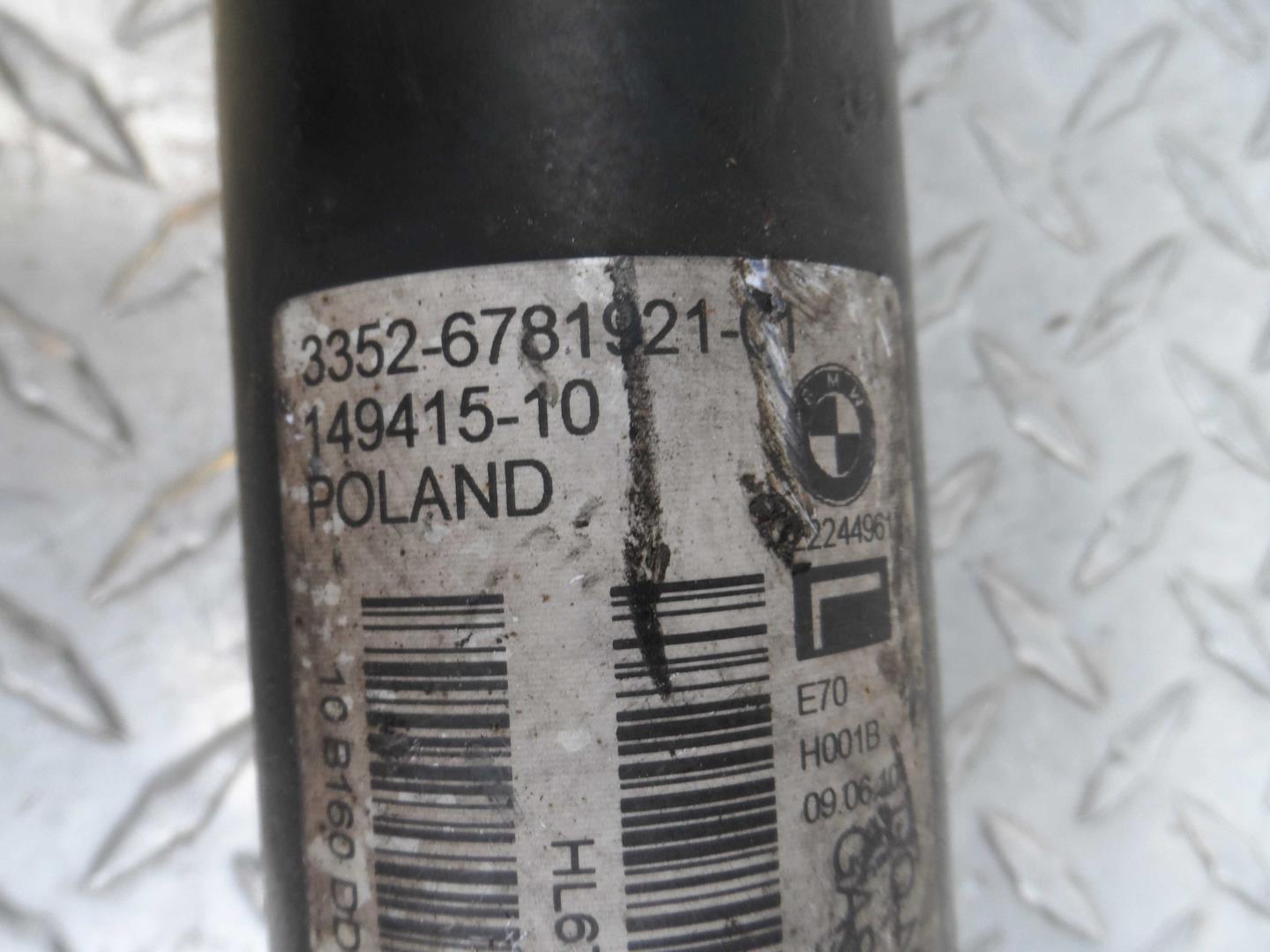 Амортизатор задний левый