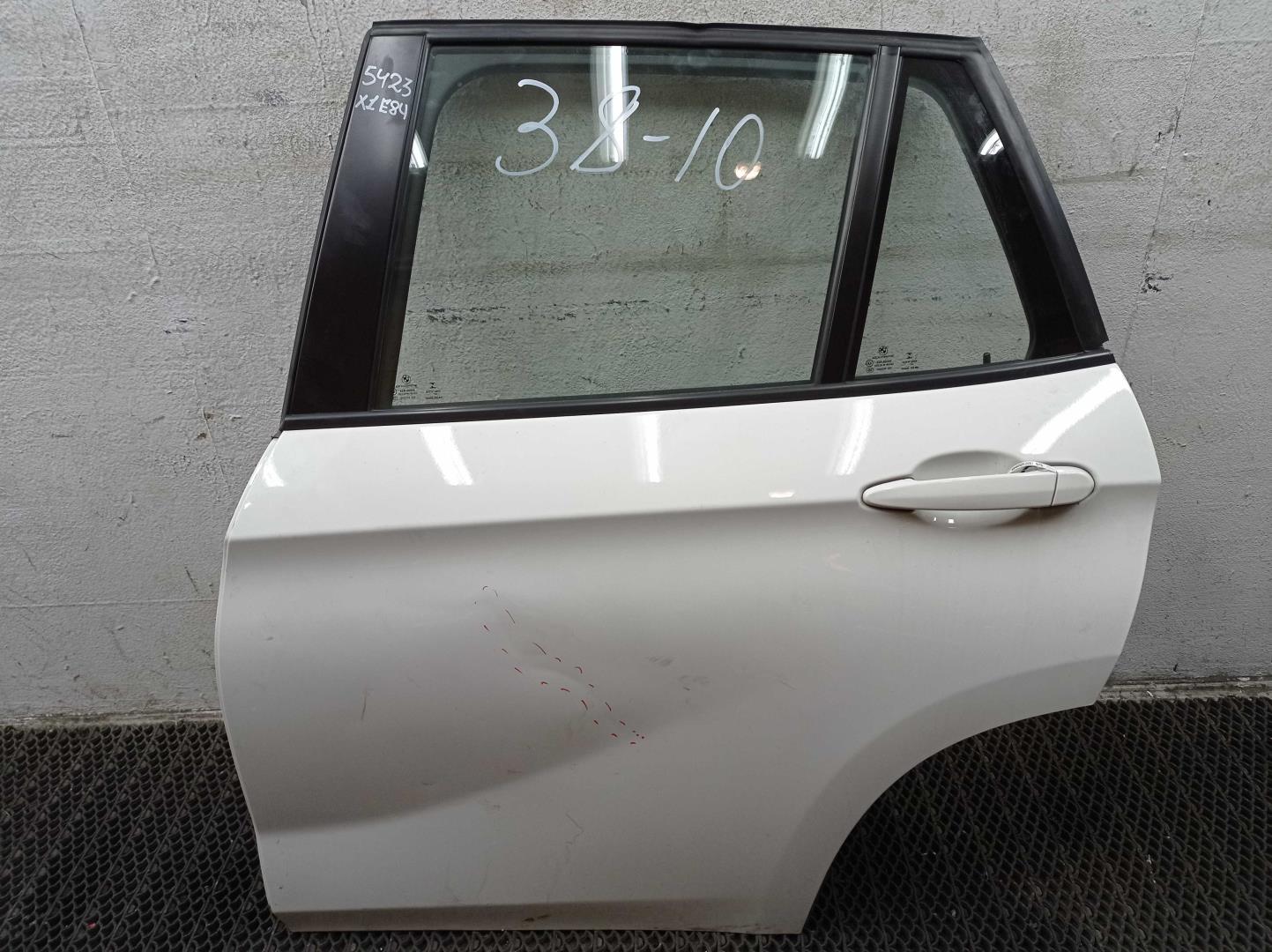 Стекло двери задней левой