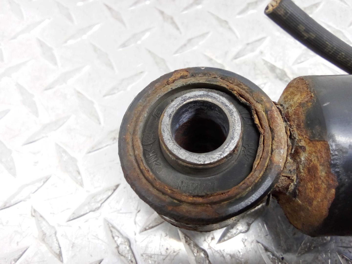 Амортизатор задний правый