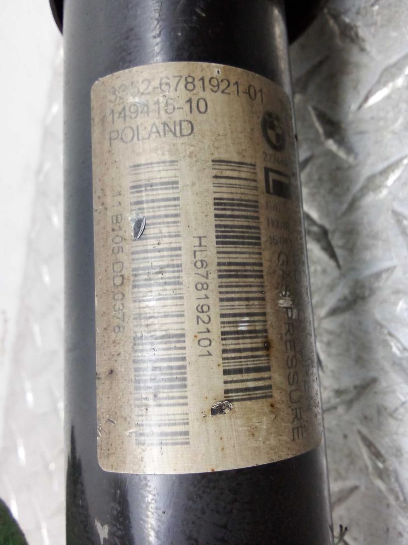 Амортизатор задний левый