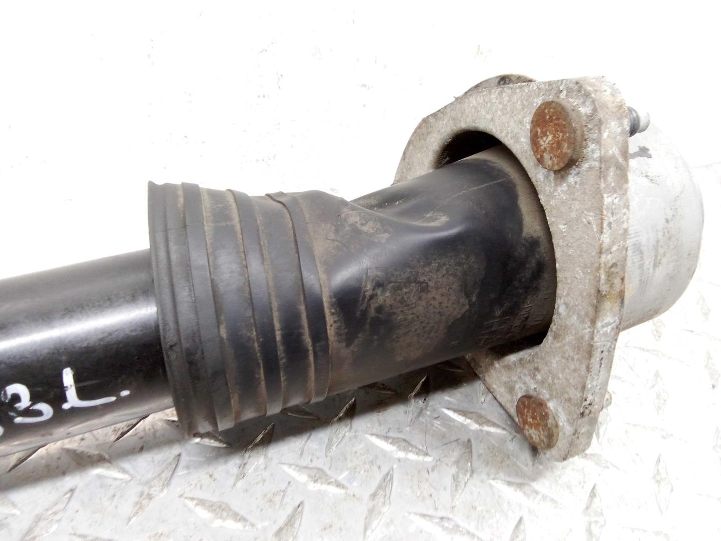 Амортизатор задний левый