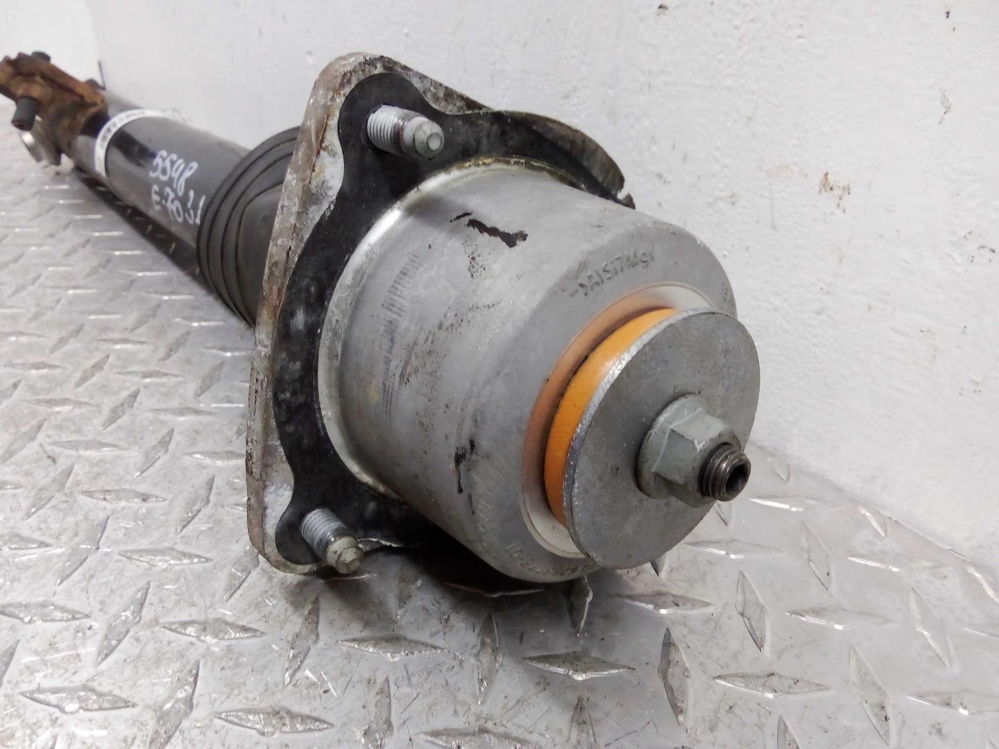 Амортизатор задний левый