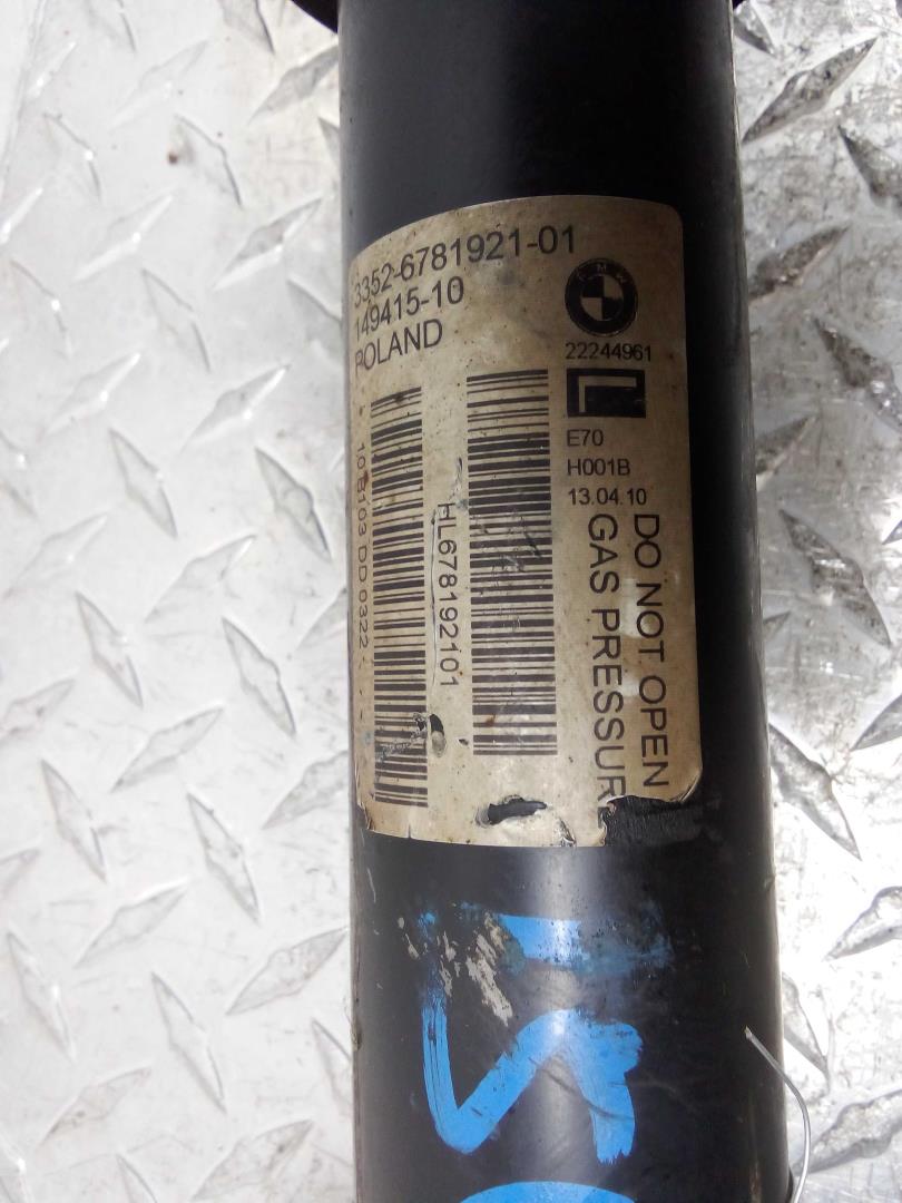 Амортизатор задний левый