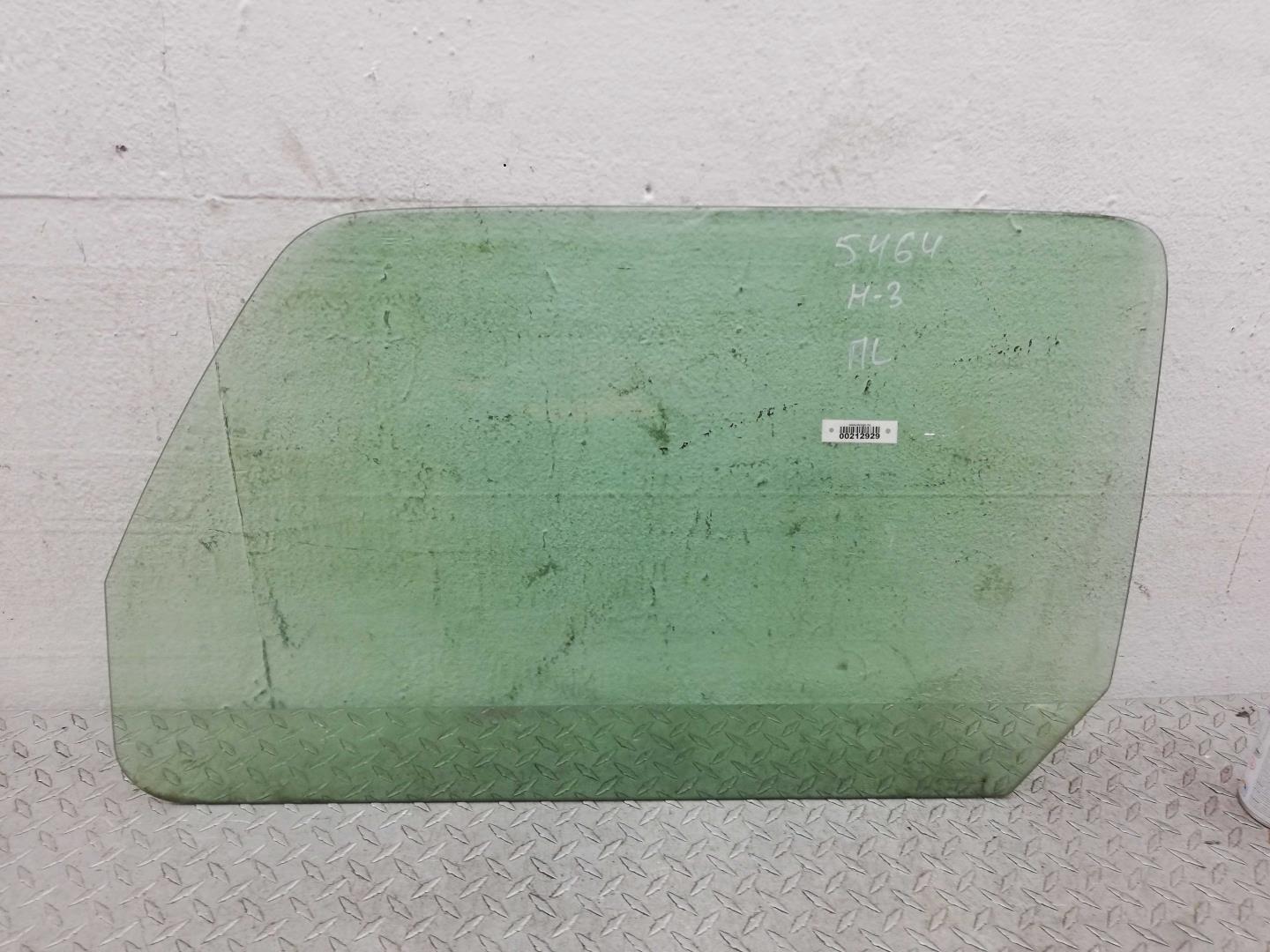 Стекло двери передней левой