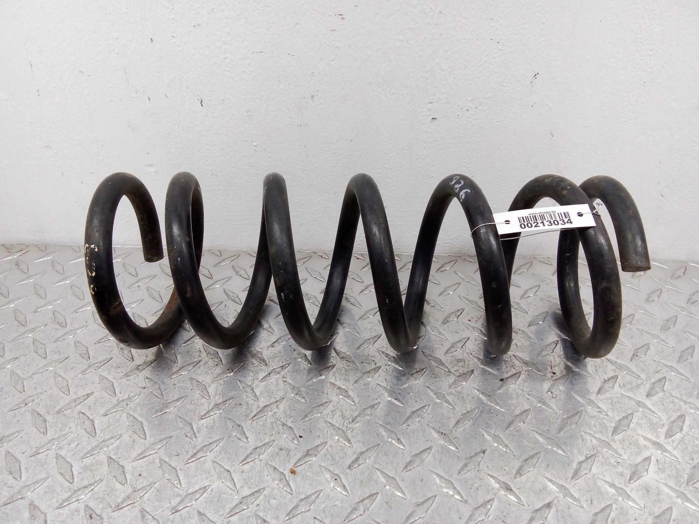 Пружина задняя