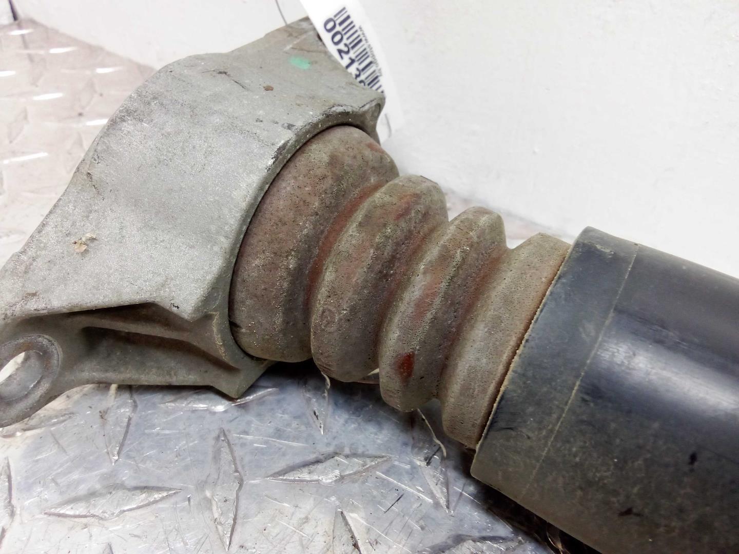 Амортизатор задний левый