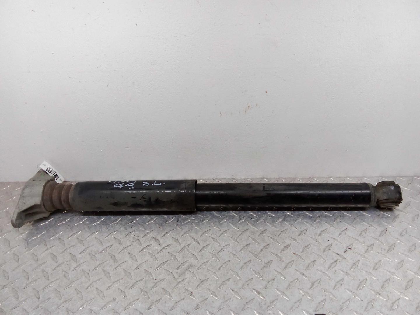 Амортизатор задний левый