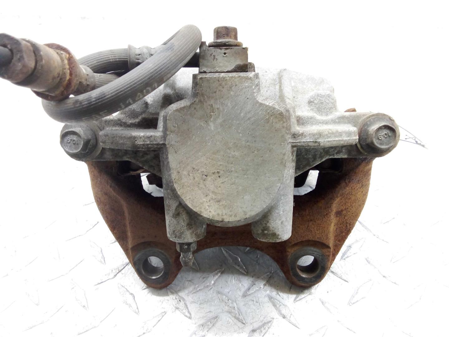 Суппорт задний левый