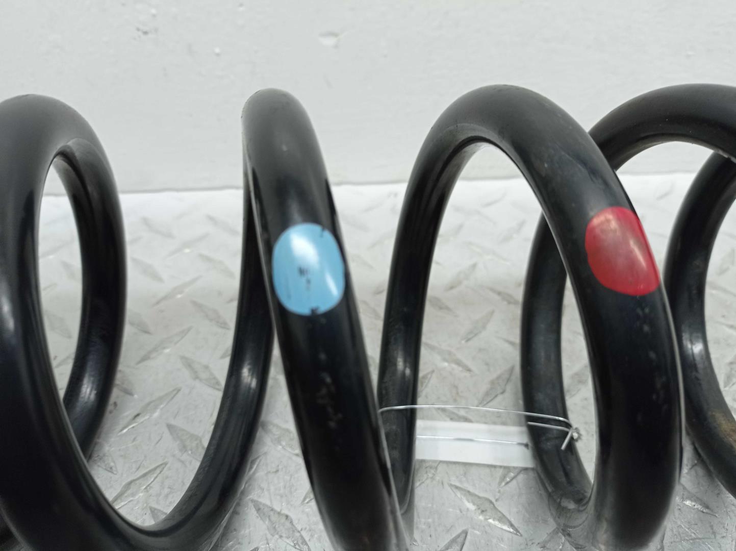 Пружина задняя