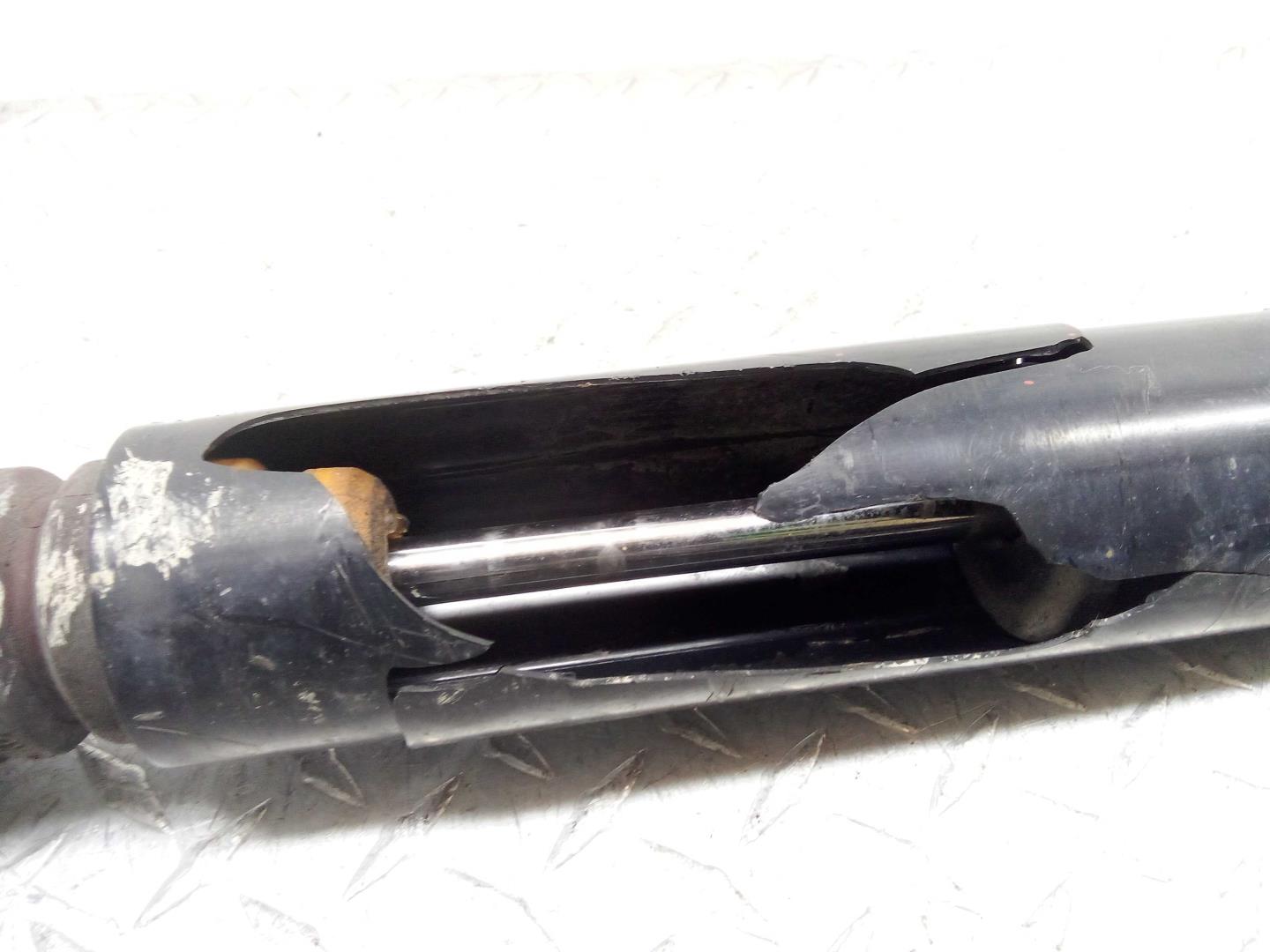 Амортизатор задний правый