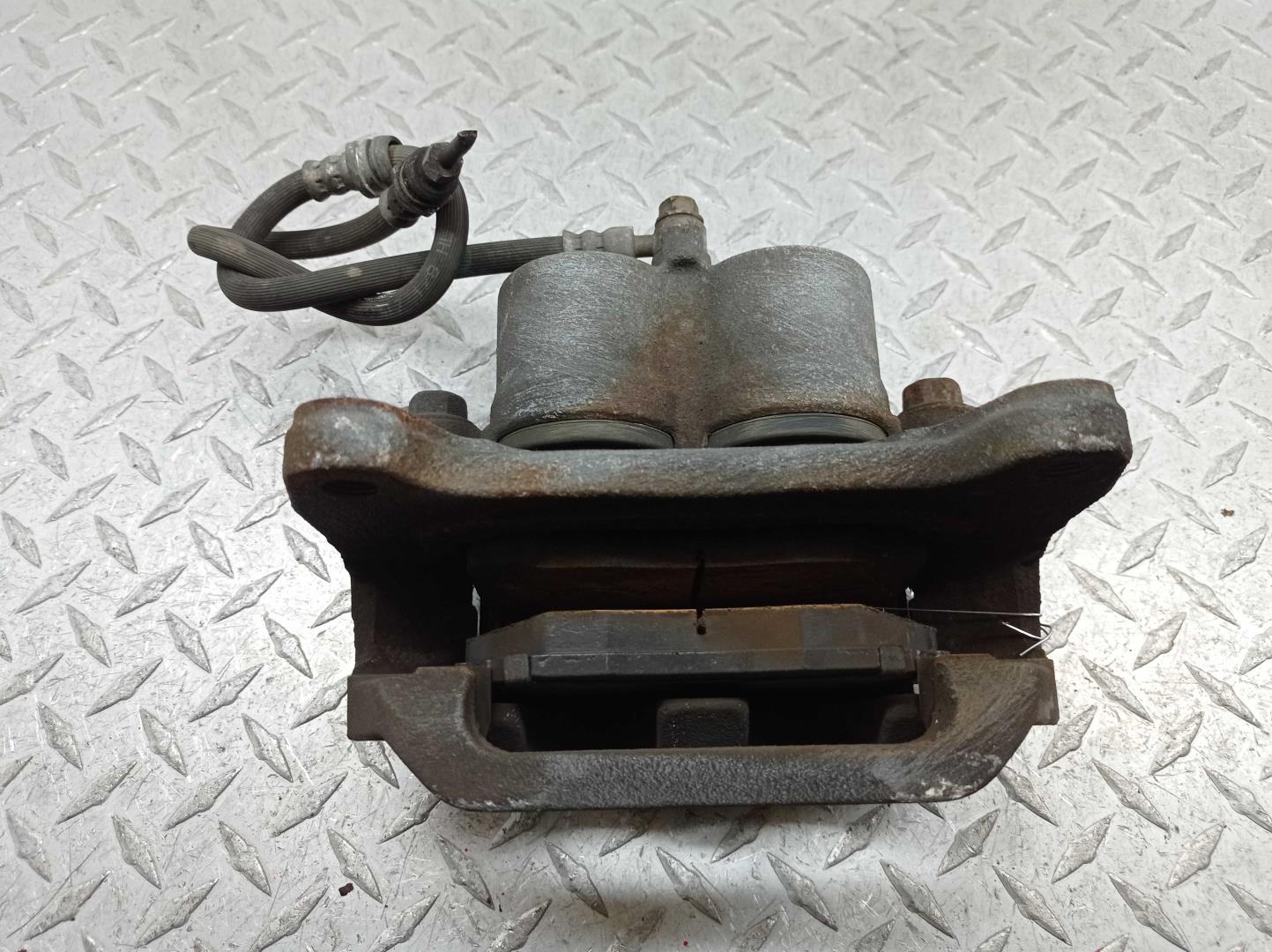 Суппорт передний левый