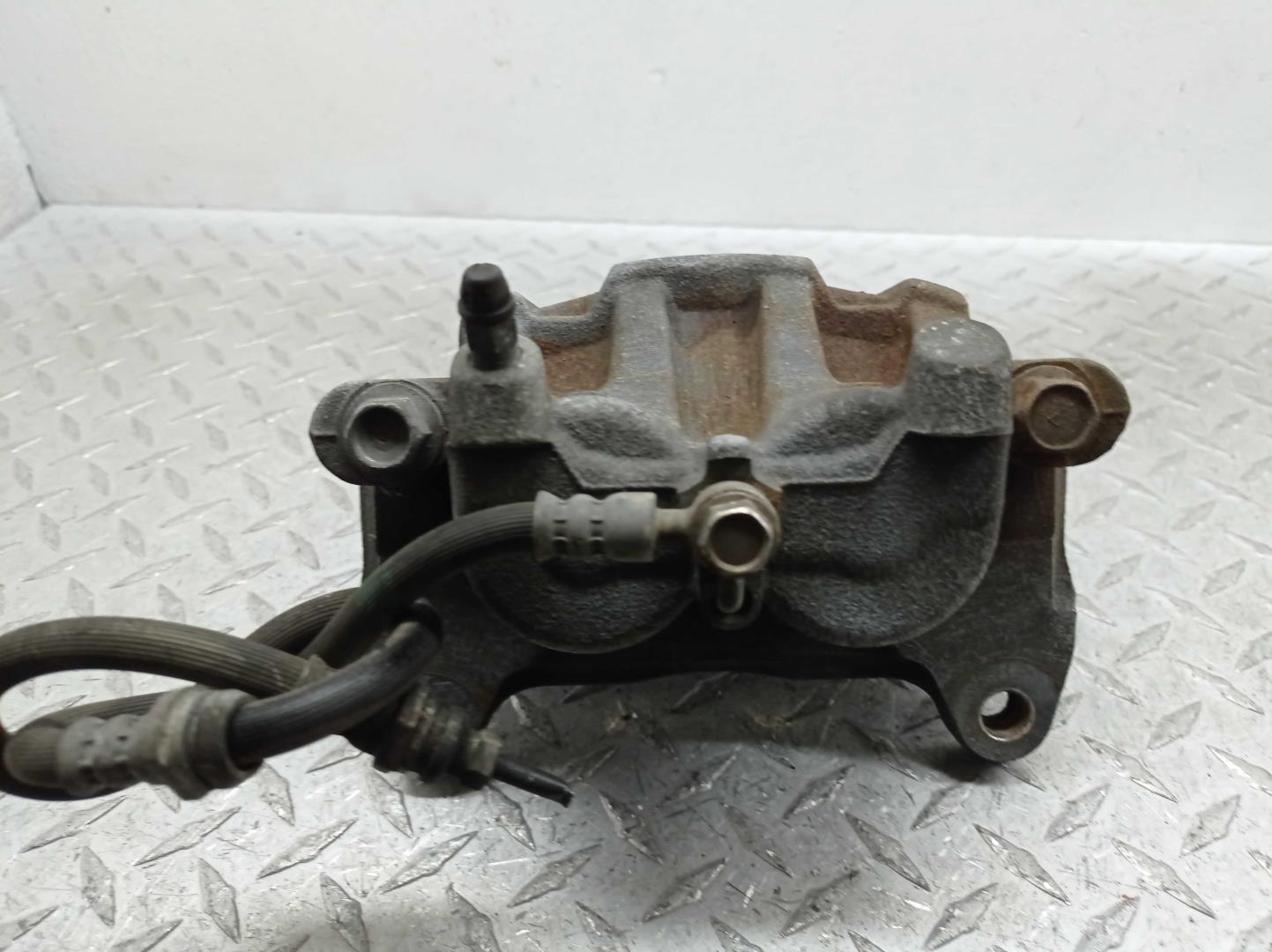 Суппорт передний левый