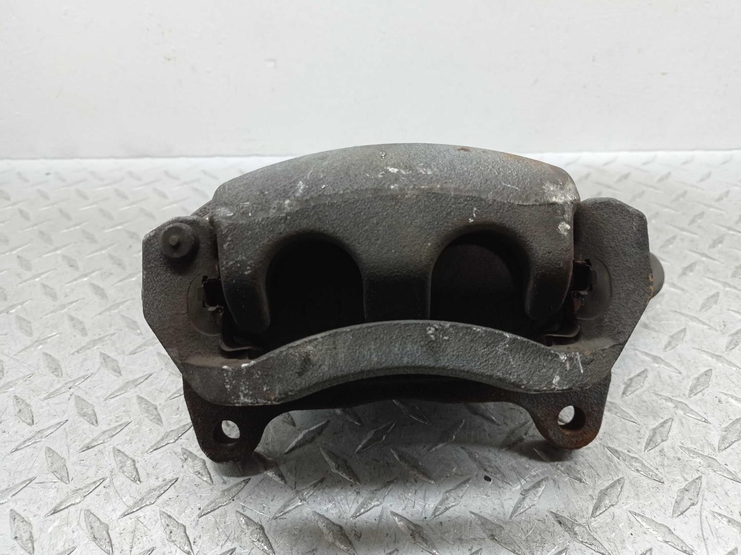 Суппорт передний левый