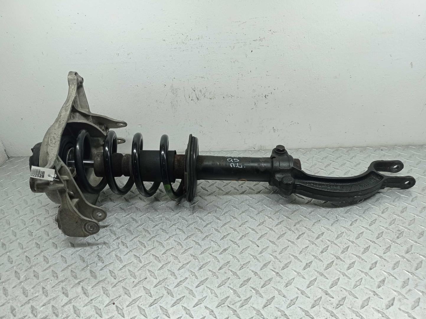 Амортизатор передний левый