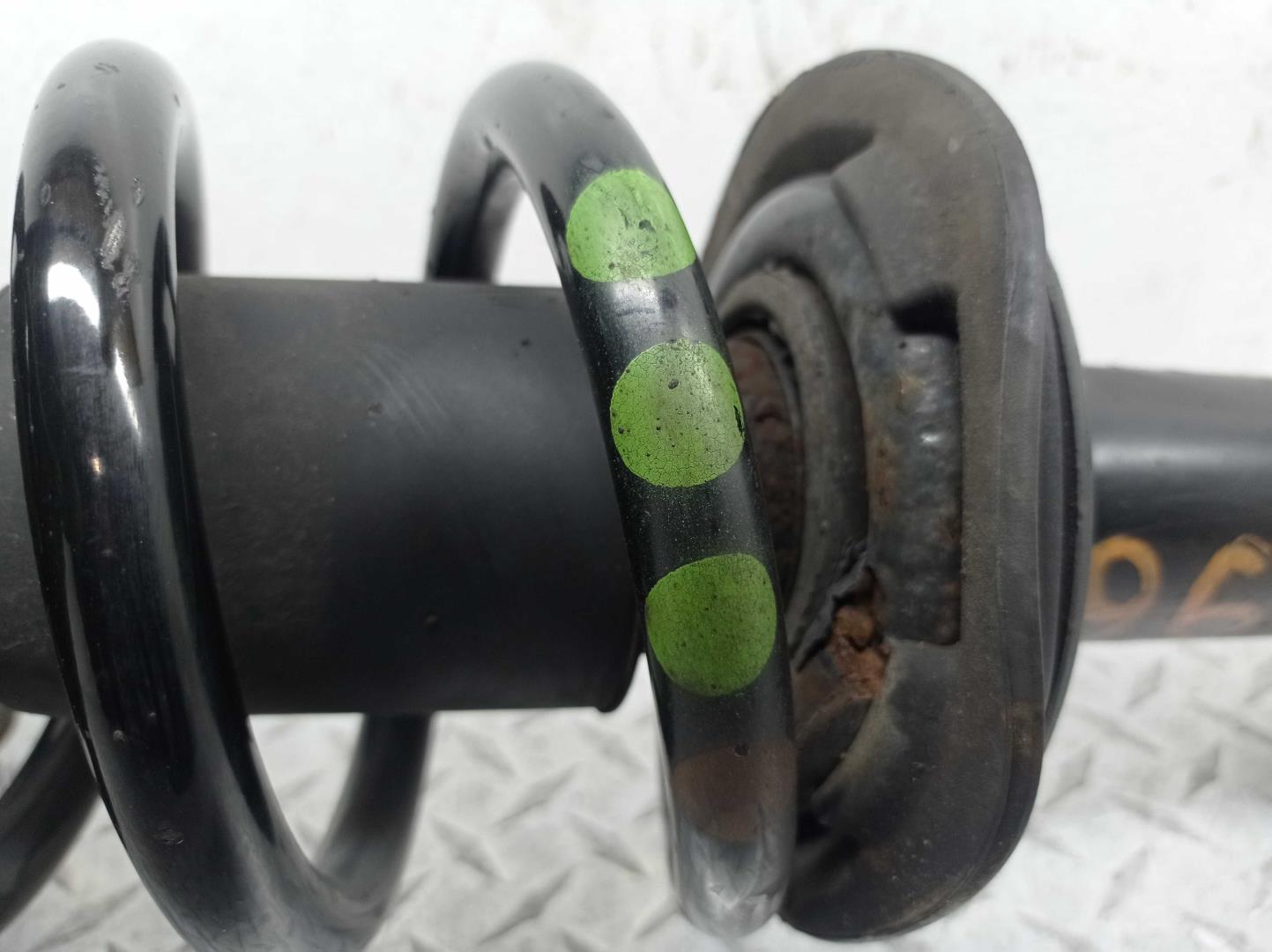 Амортизатор передний левый