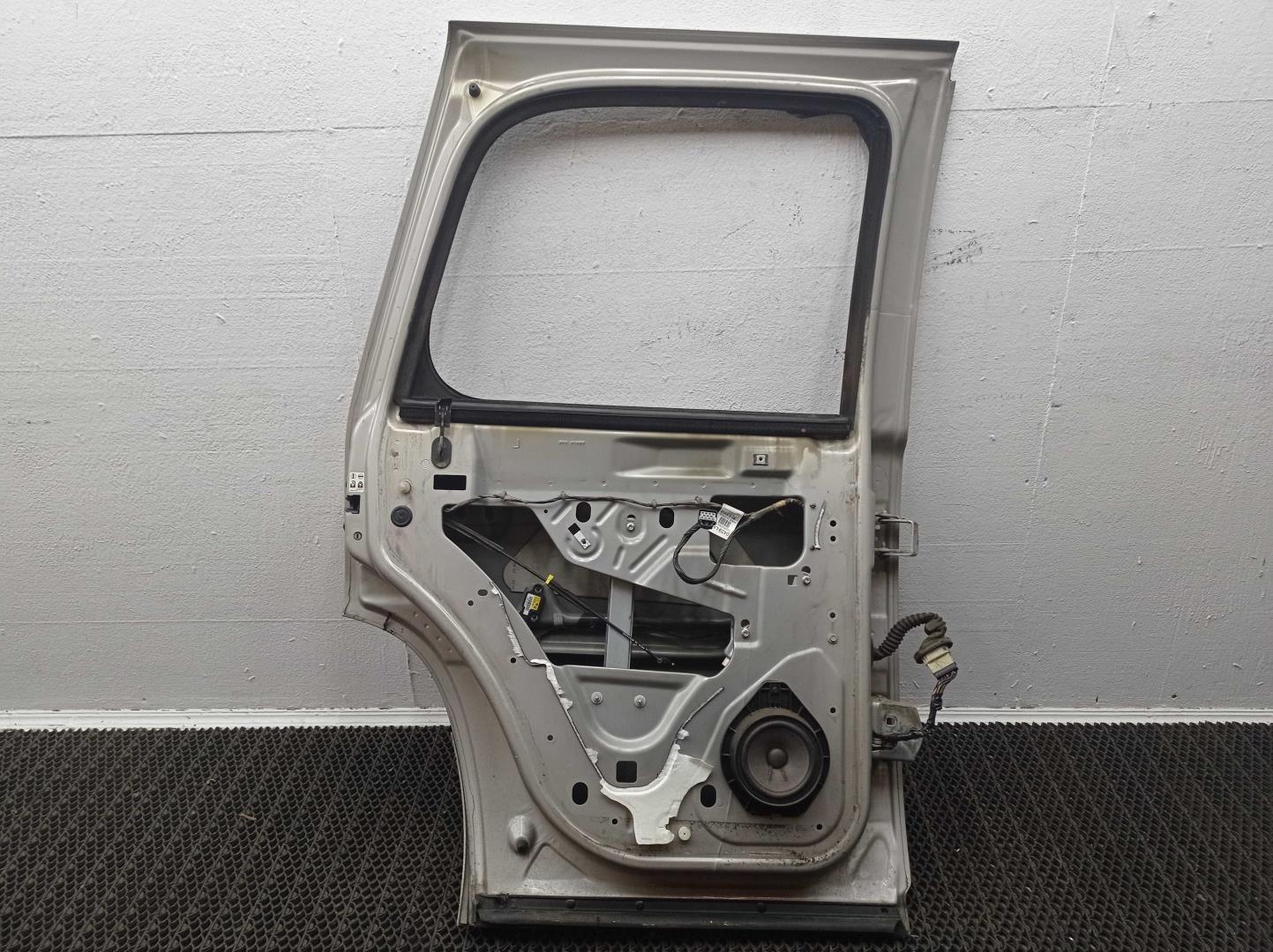 Стеклоподъемник электр. задний левый