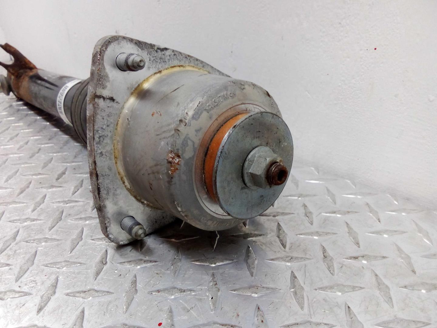 Амортизатор задний левый