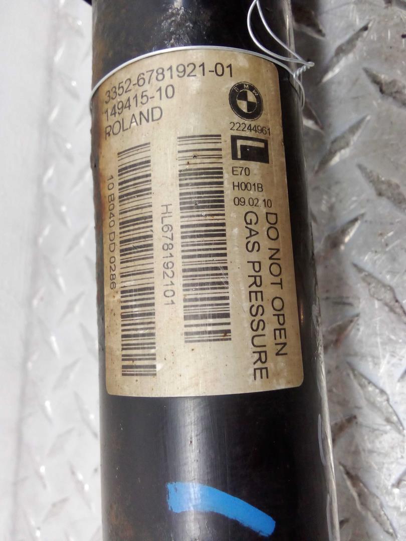 Амортизатор задний левый