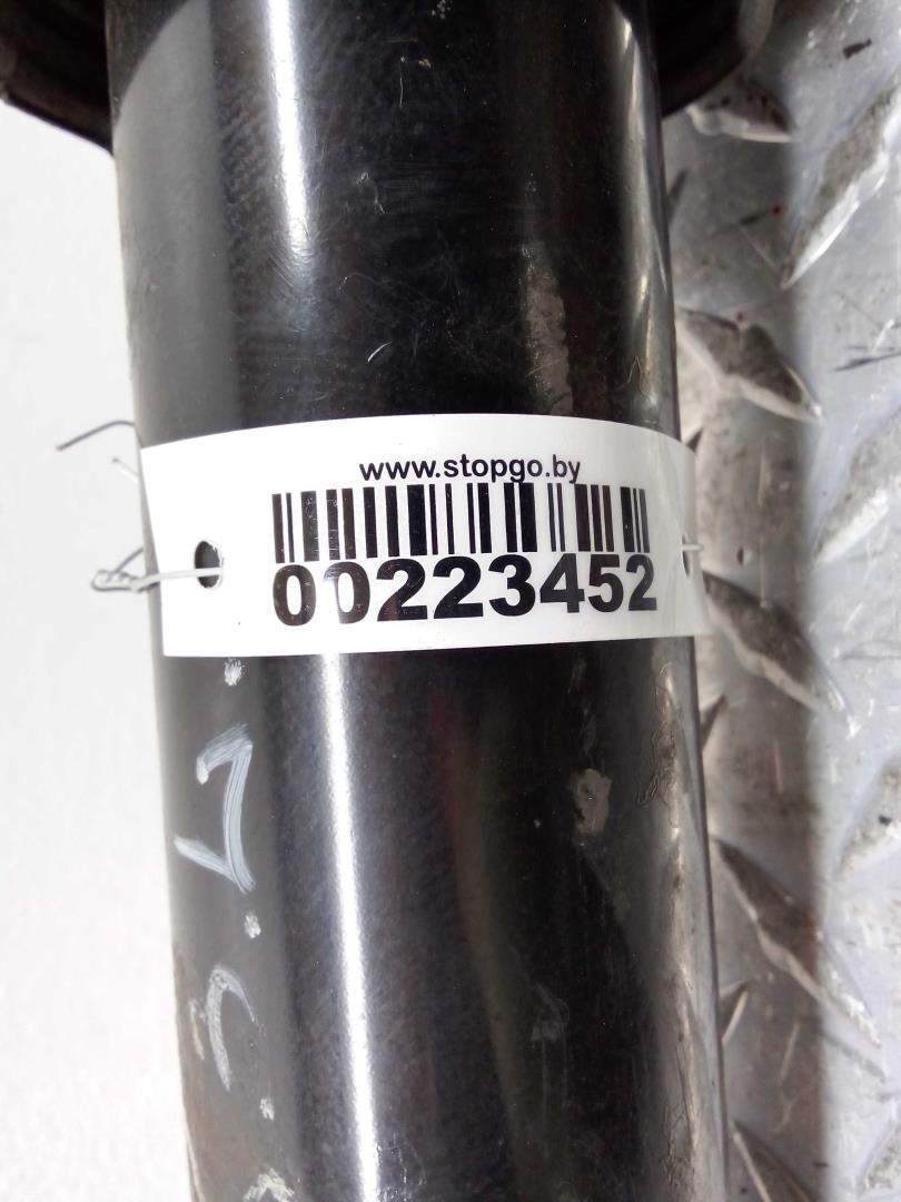 Амортизатор задний левый