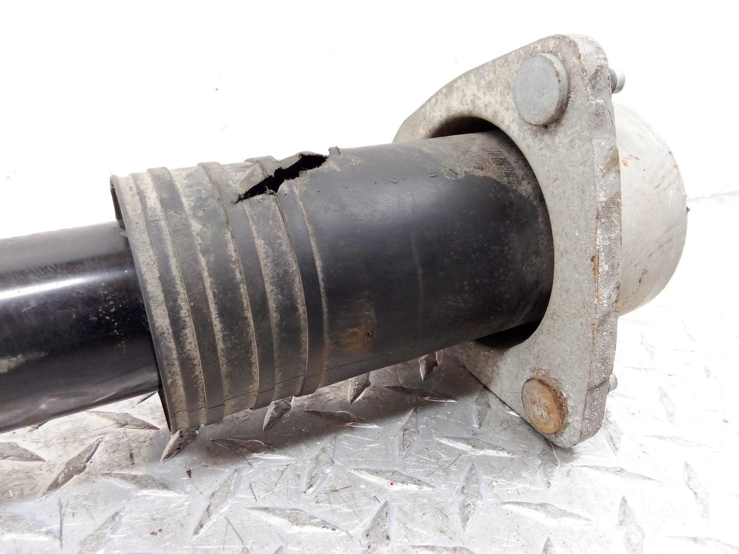 Амортизатор задний левый