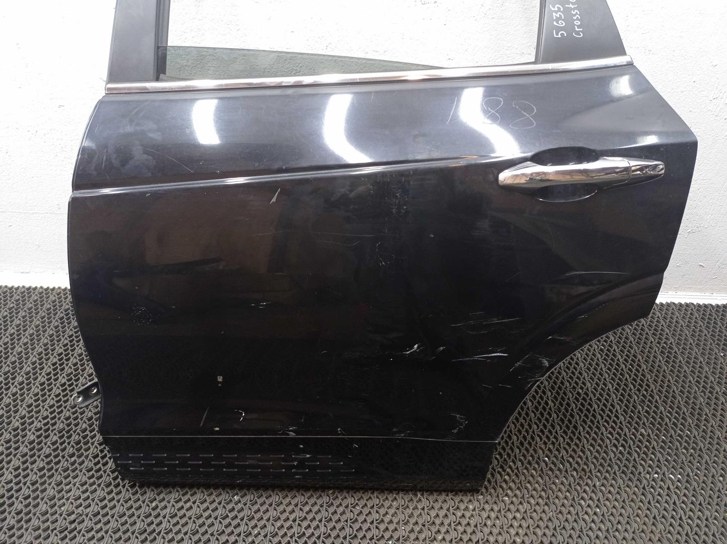 Стекло двери задней левой