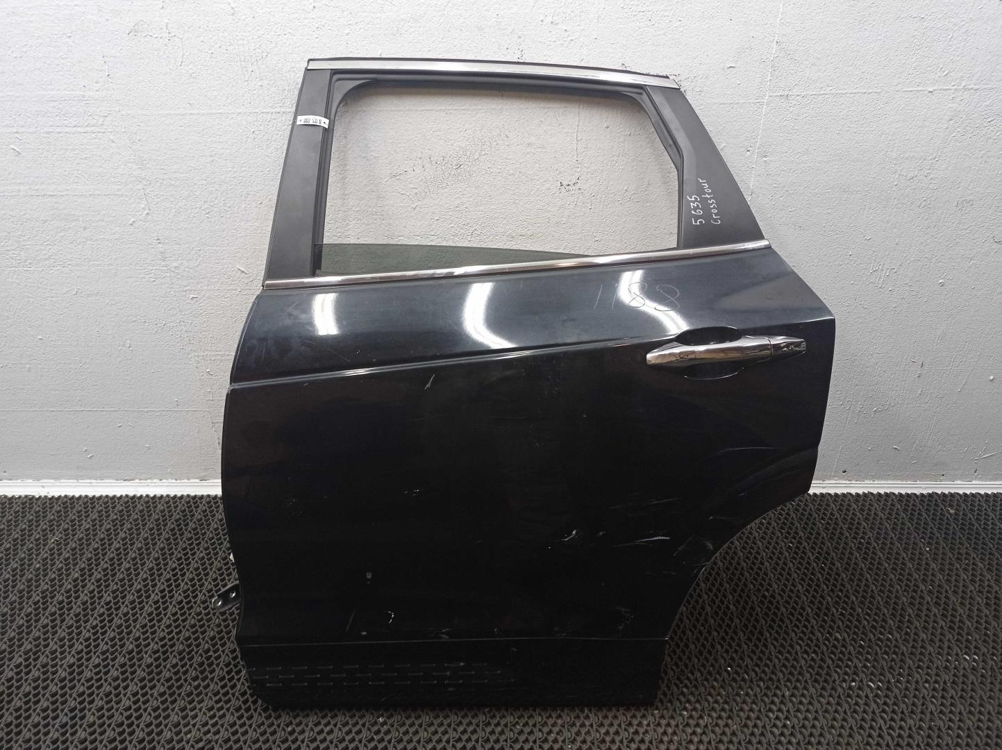 Стекло двери задней левой