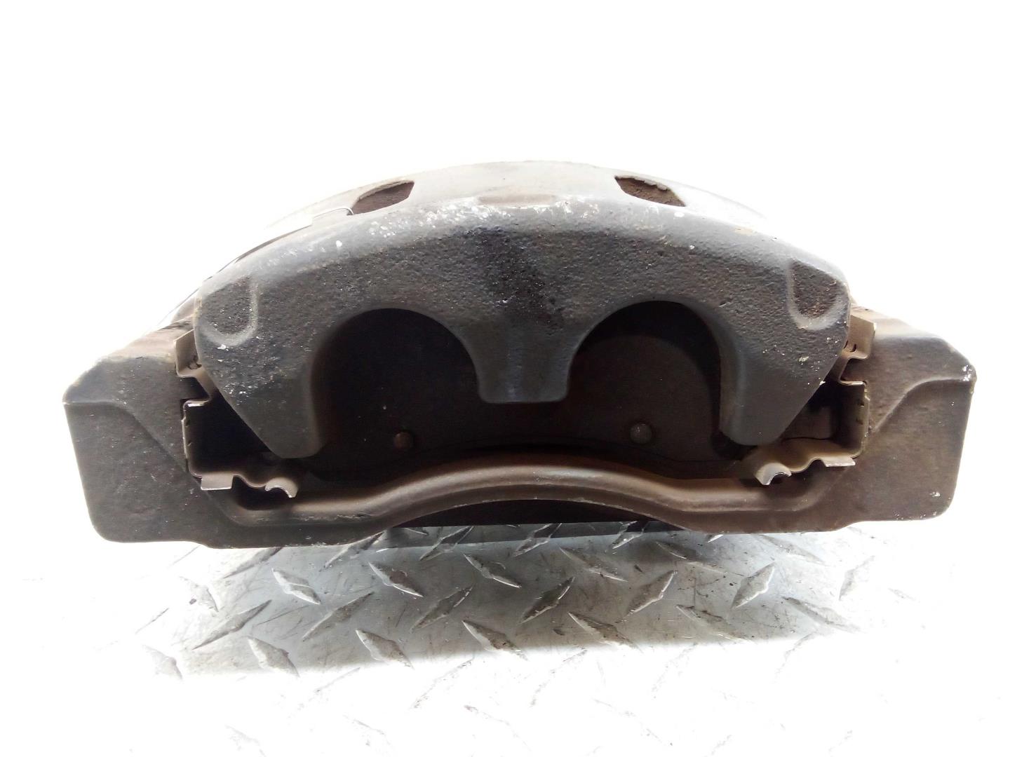 Суппорт передний левый