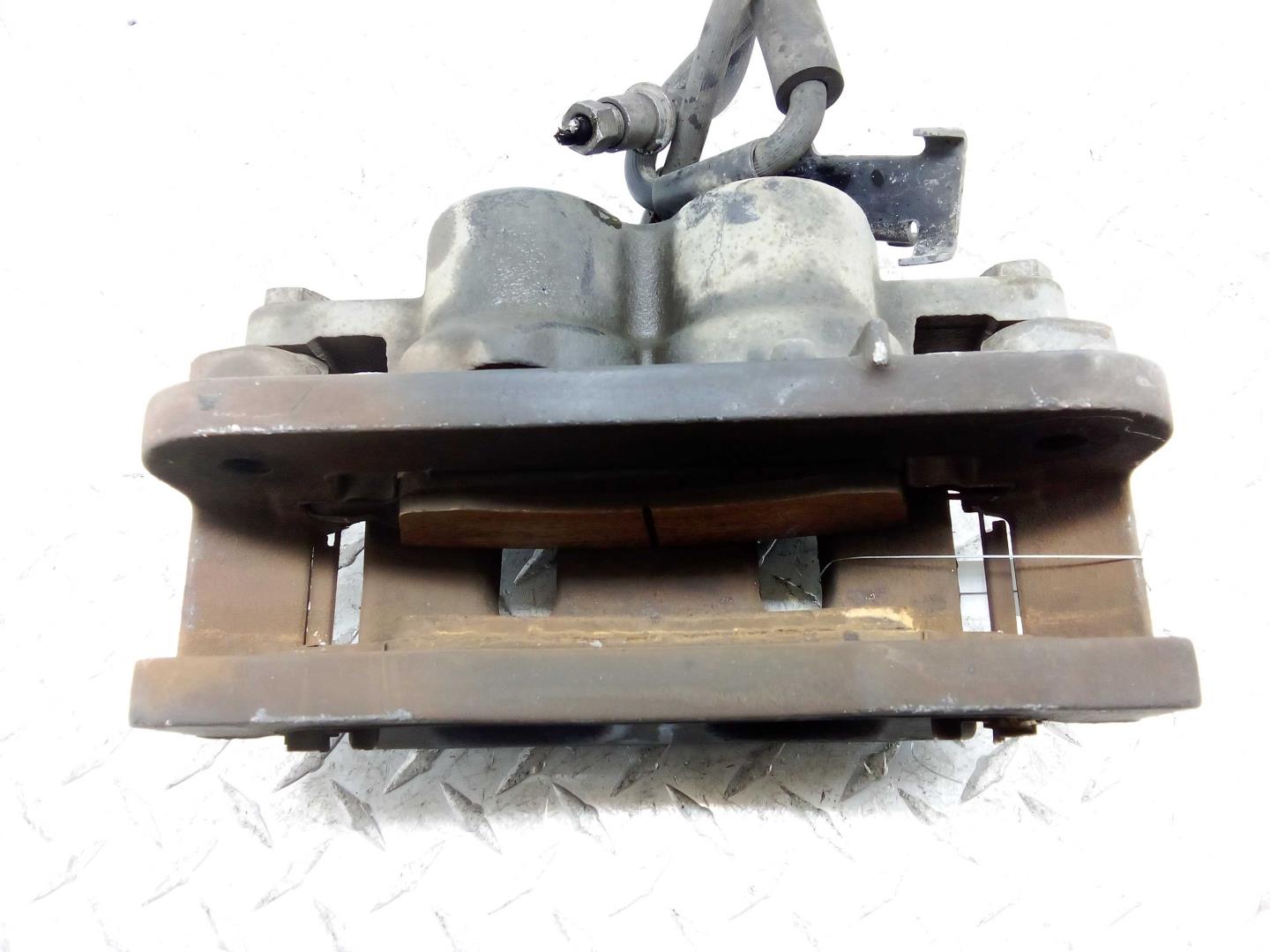 Суппорт передний левый