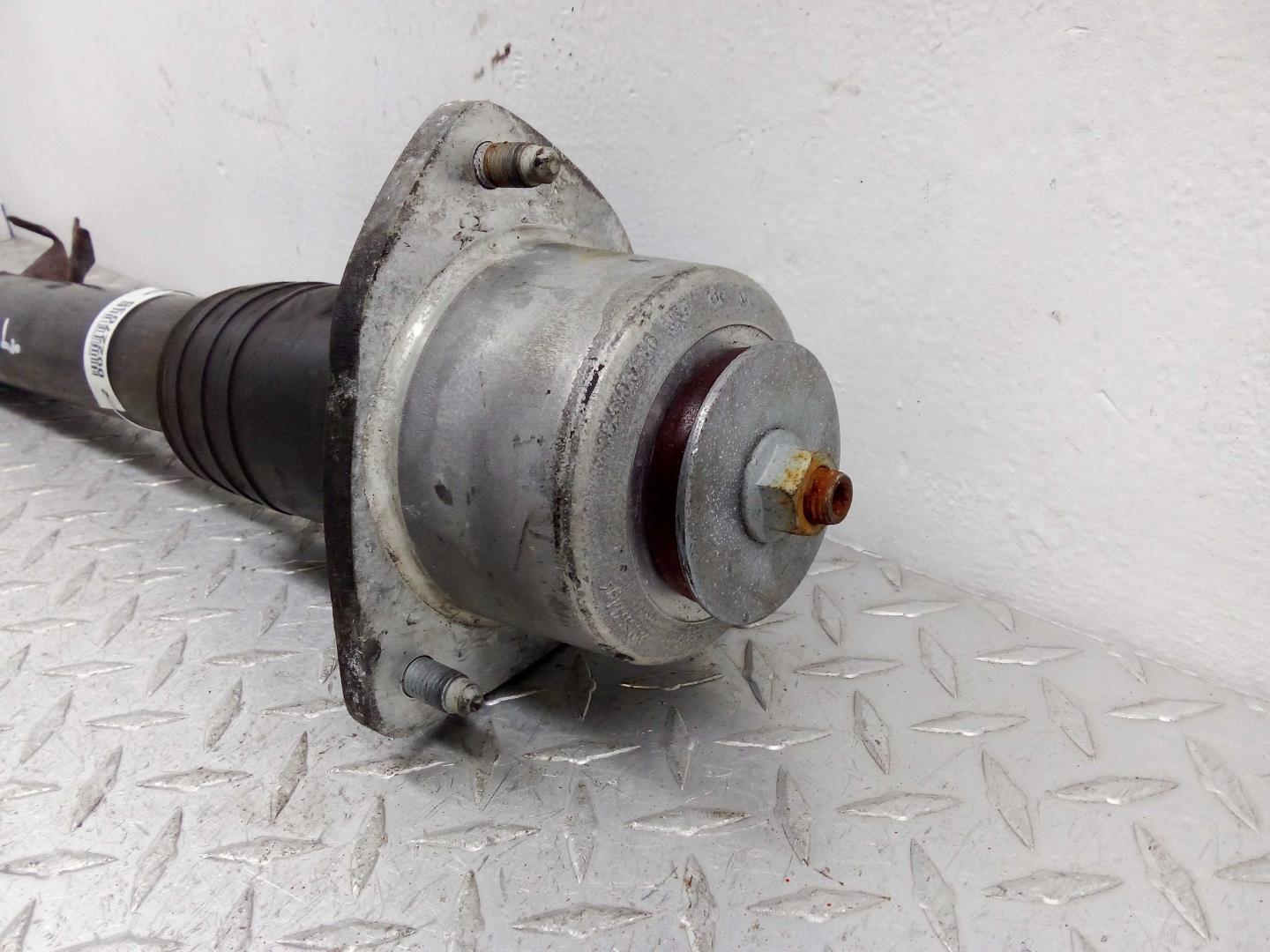 Амортизатор задний левый