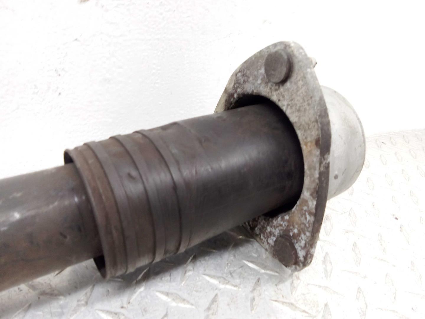 Амортизатор задний левый