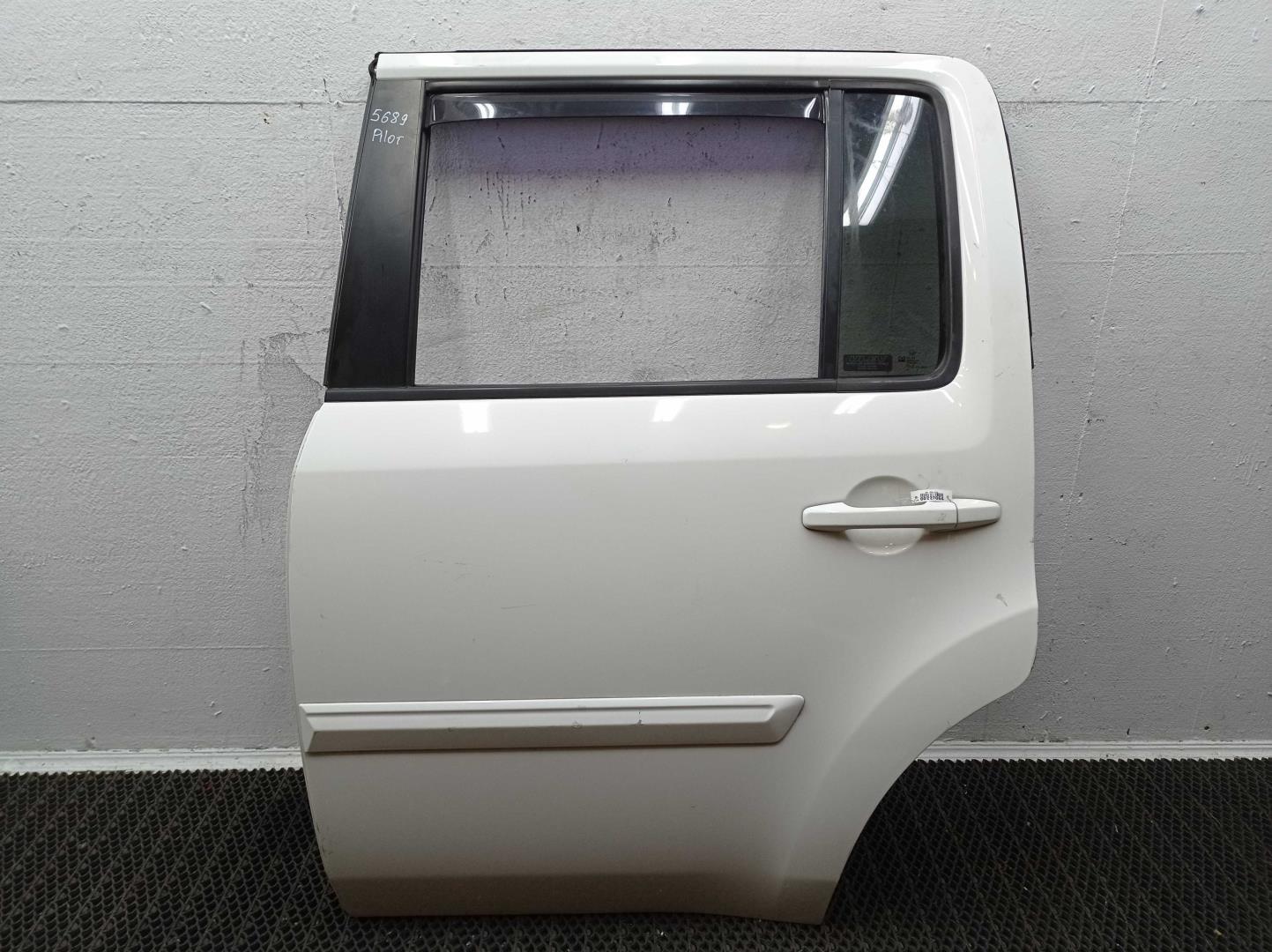 Замок двери задней левой