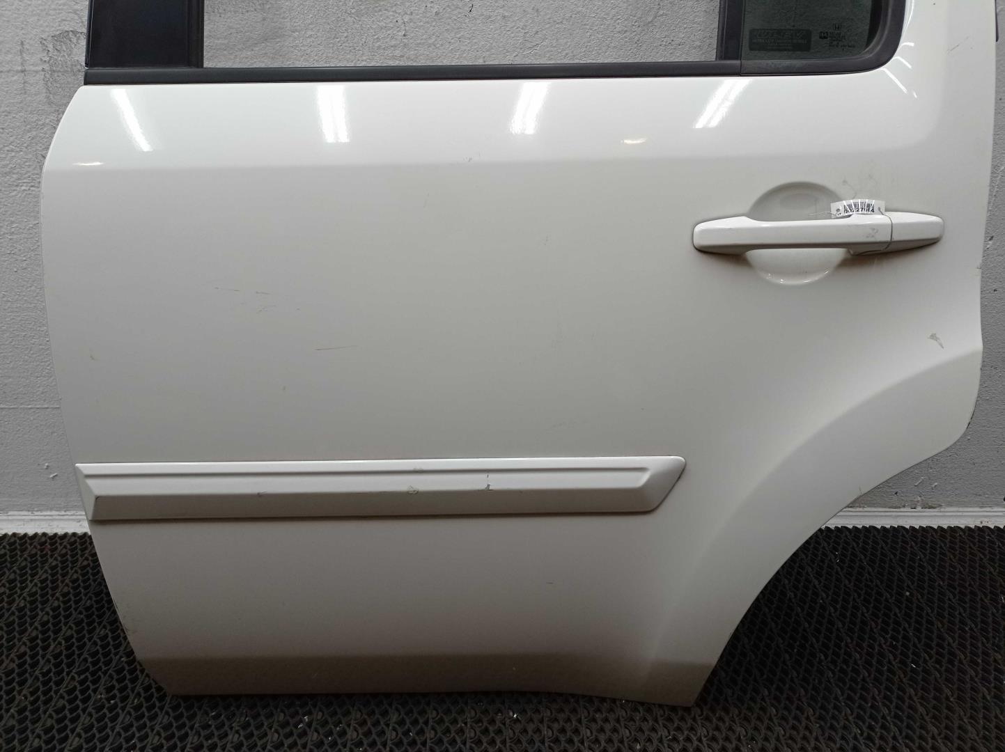 Замок двери задней левой