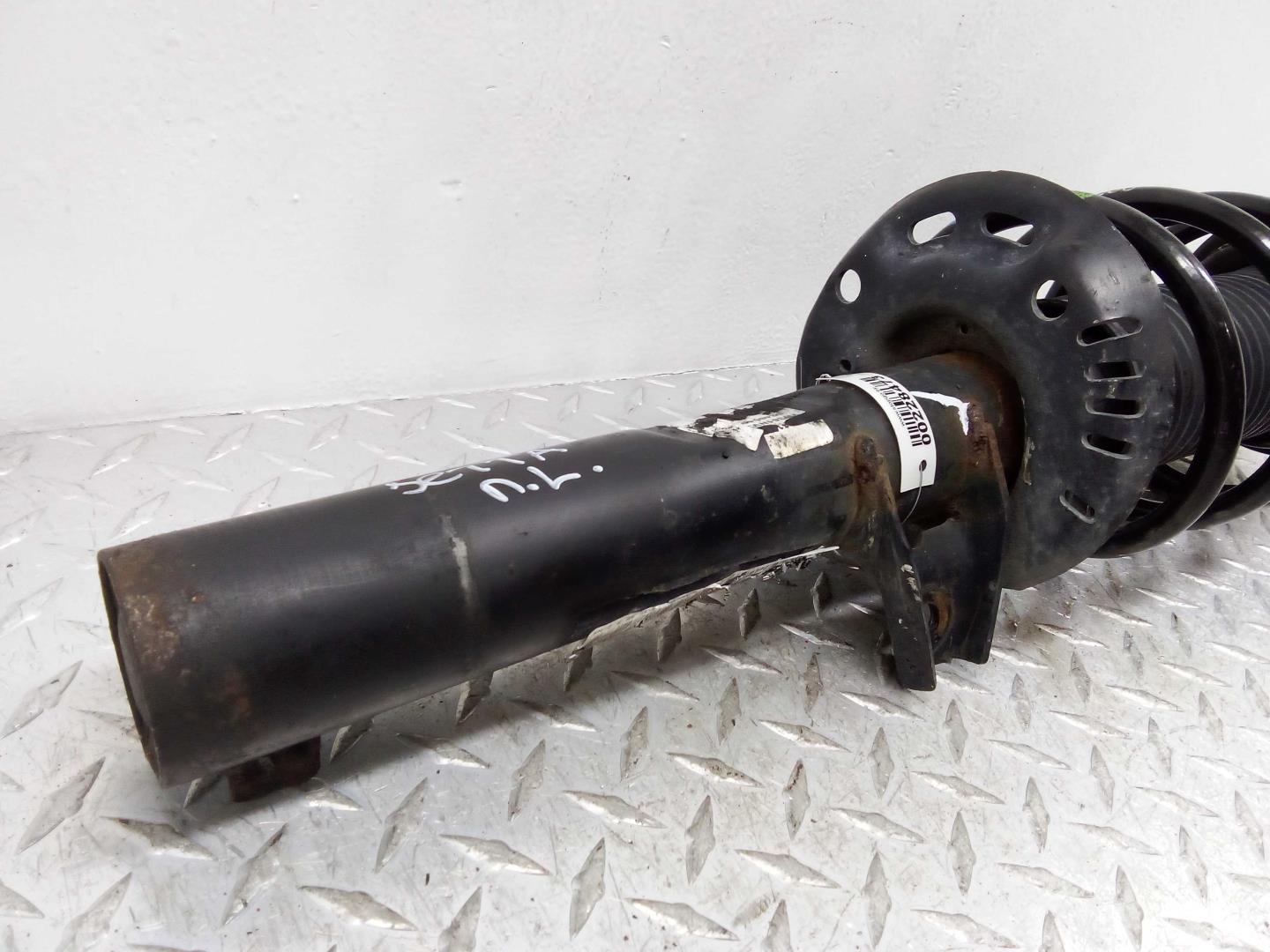 Амортизатор передний левый