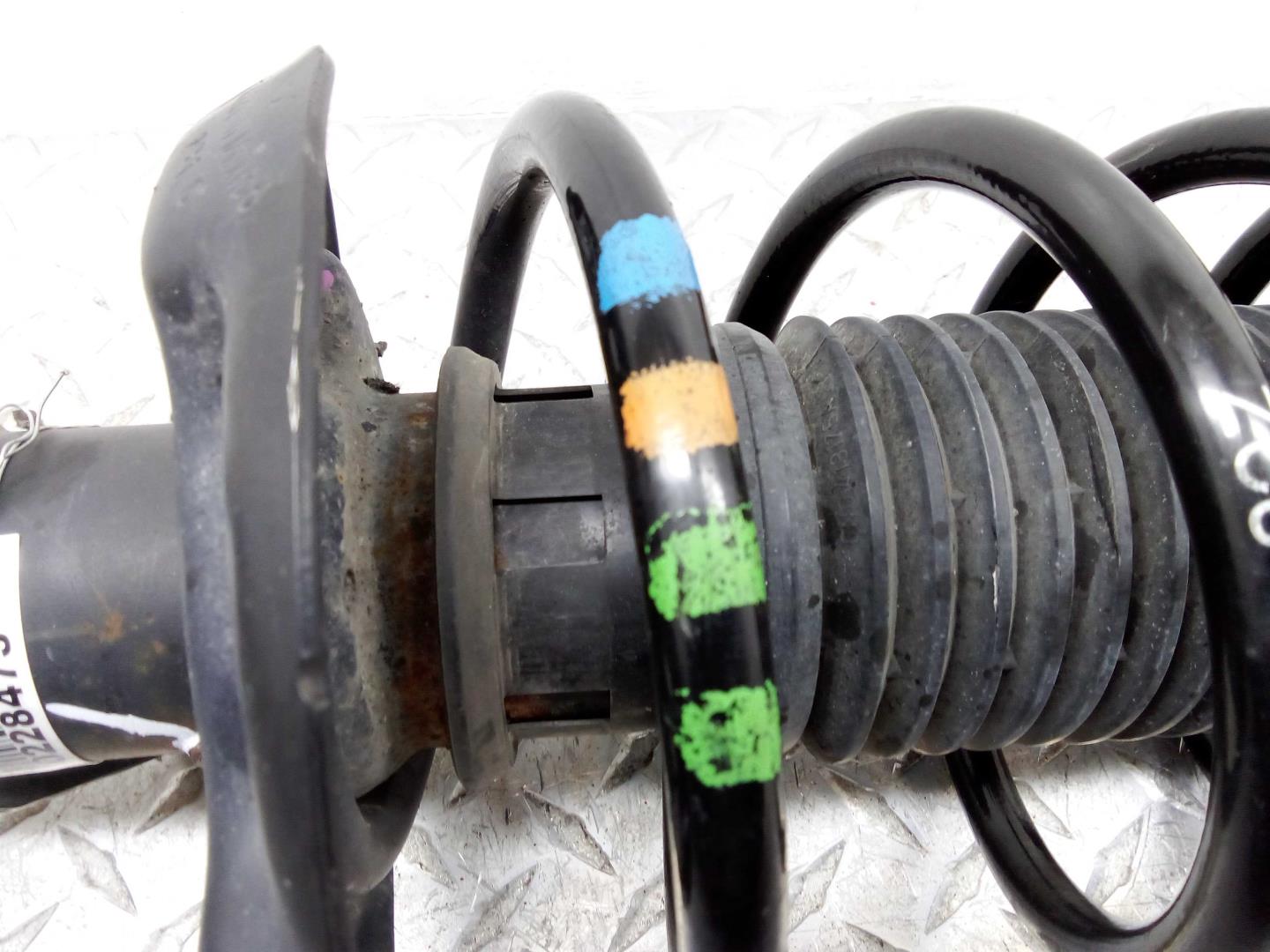 Амортизатор передний левый