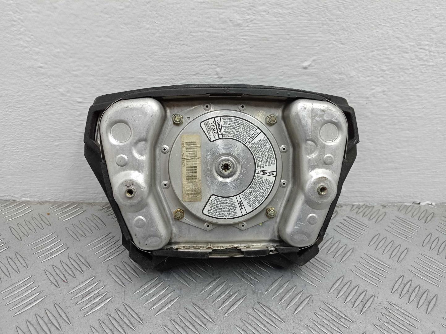 Подушка безопасности в рулевое колесо