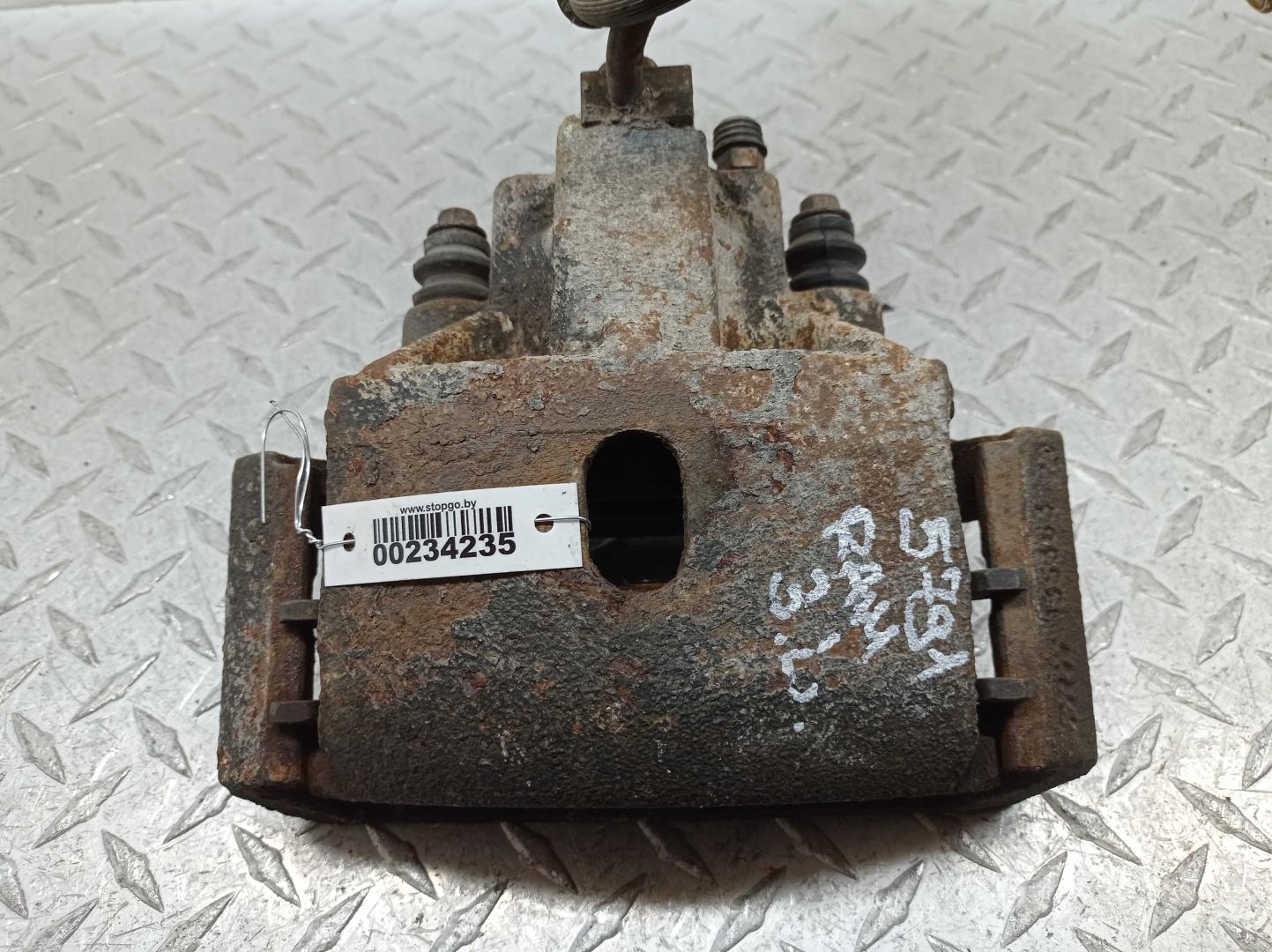 Суппорт задний левый