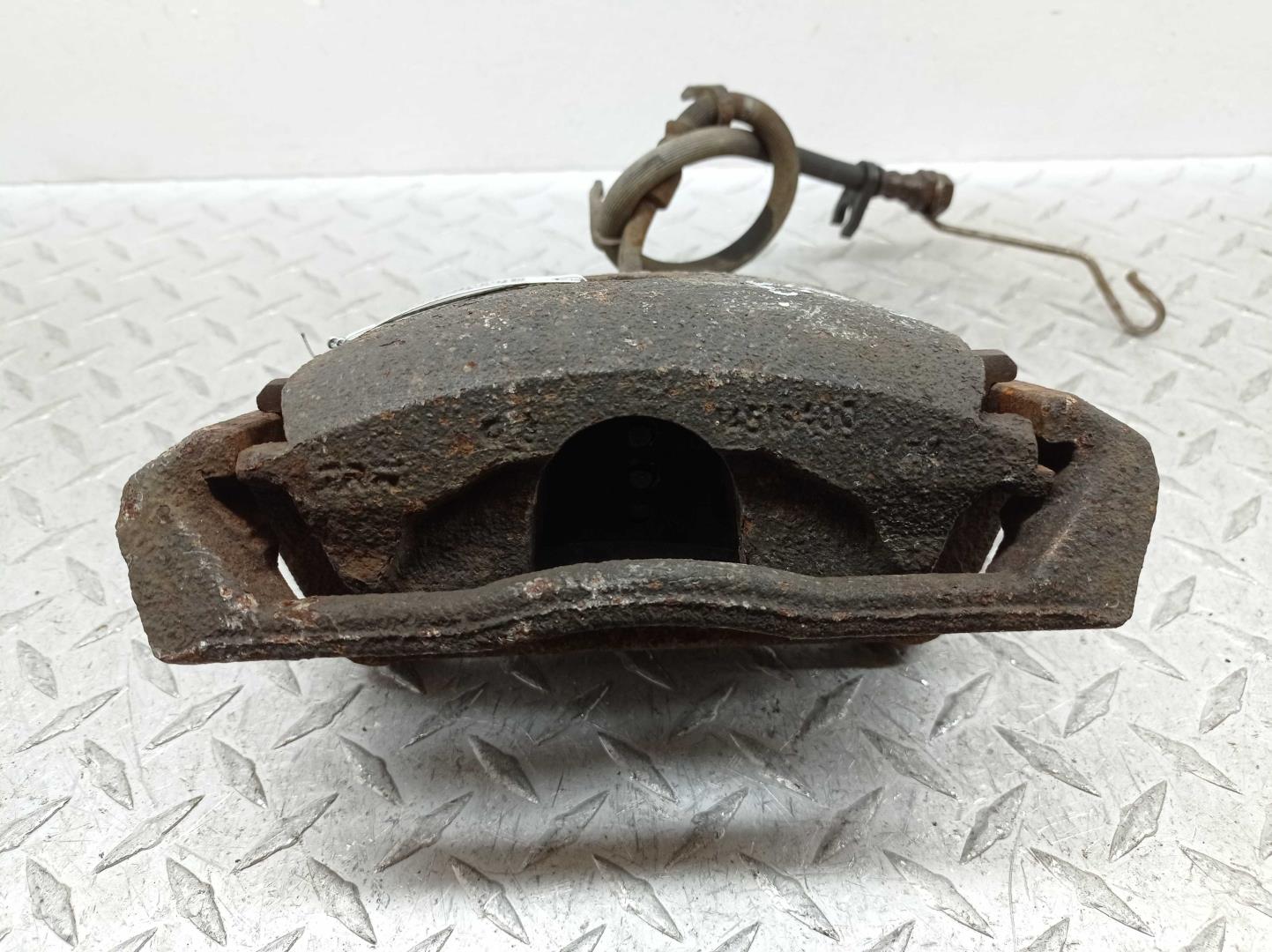 Суппорт задний левый