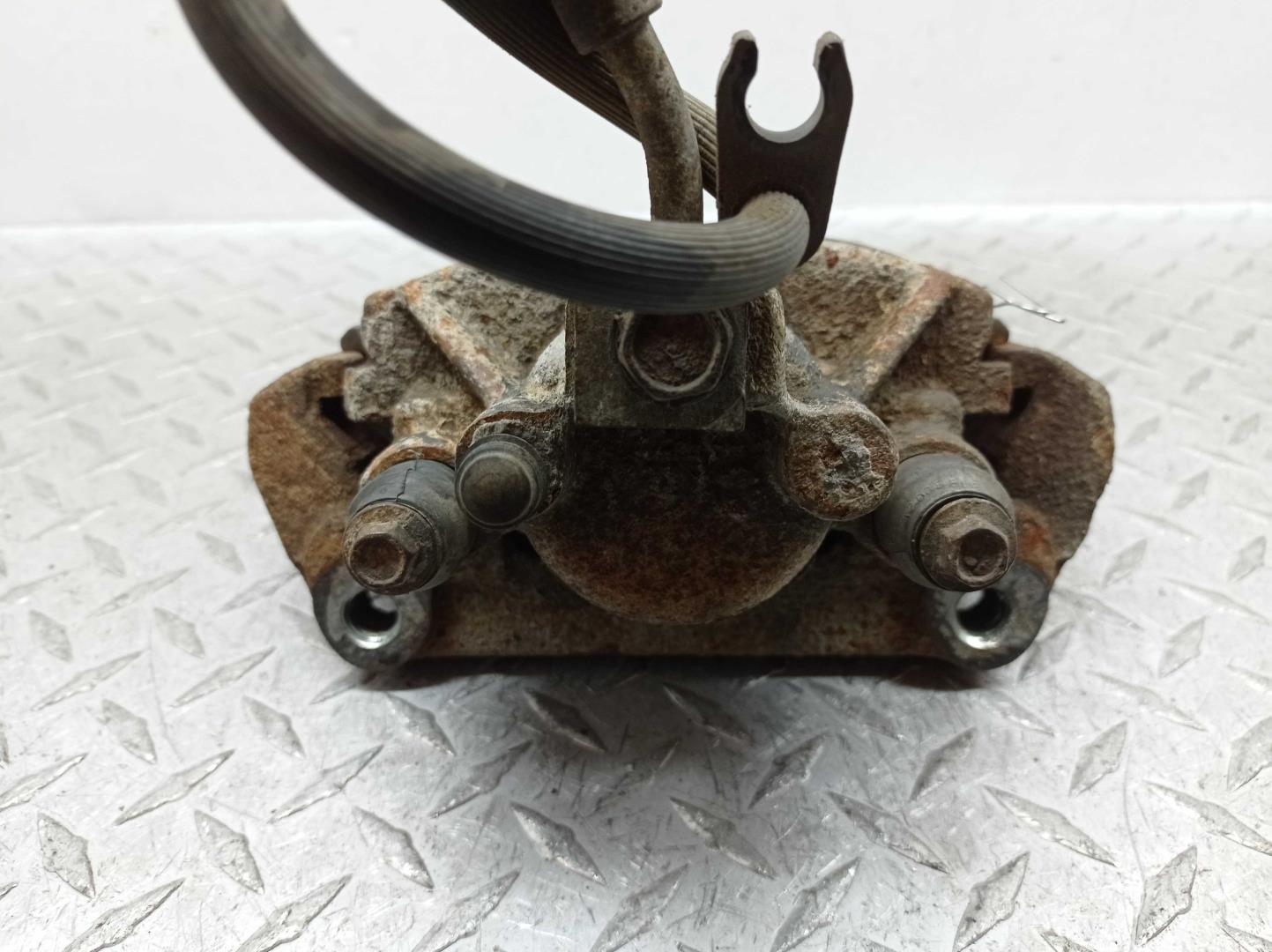 Суппорт задний левый