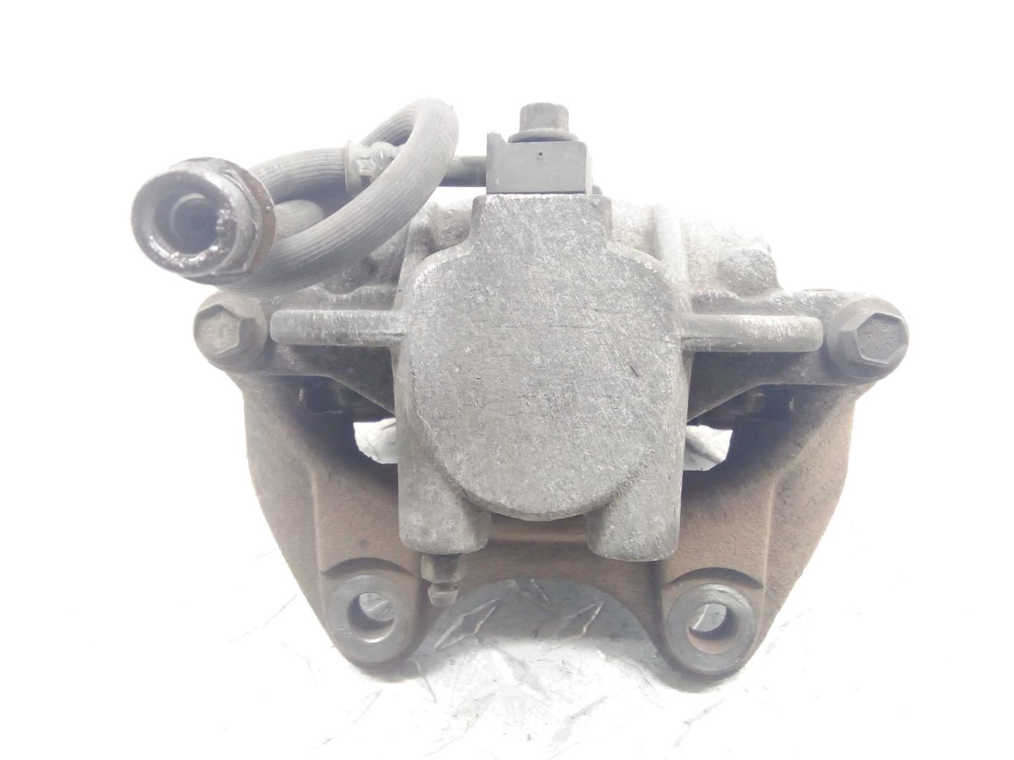 Суппорт задний левый