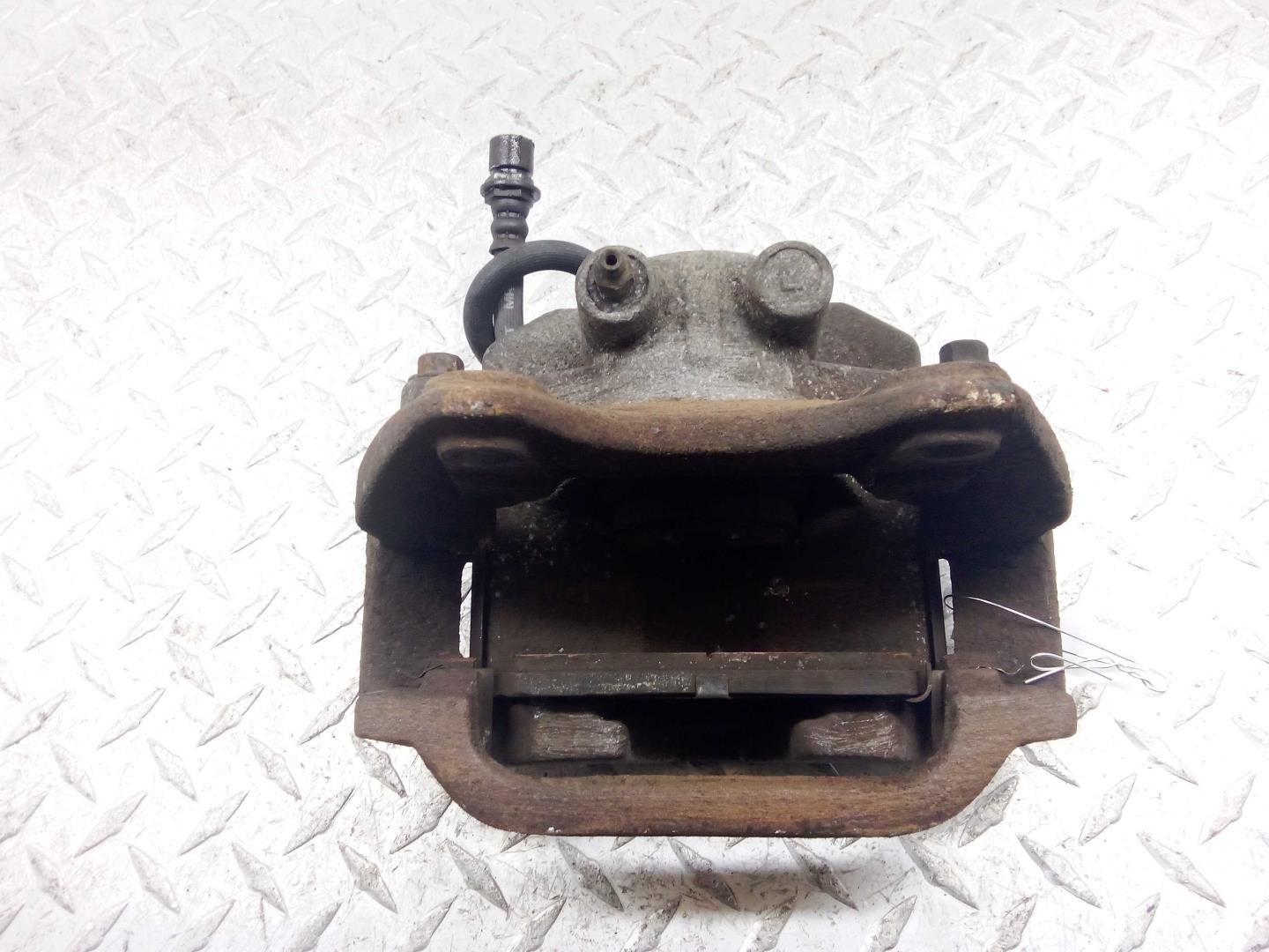 Суппорт задний левый