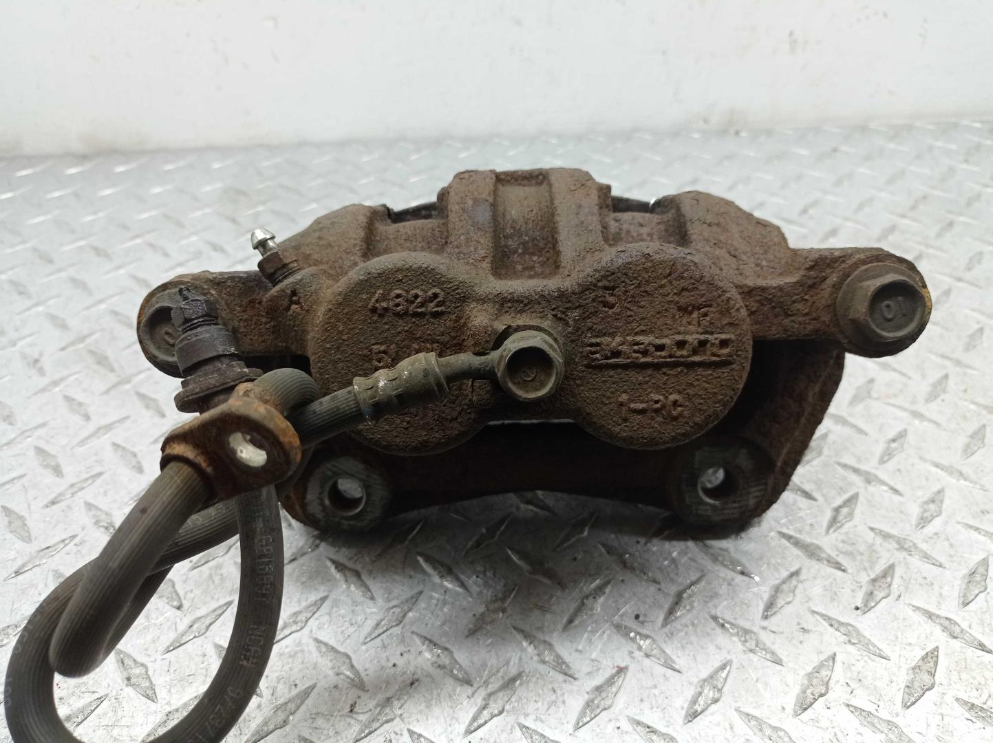 Суппорт передний левый