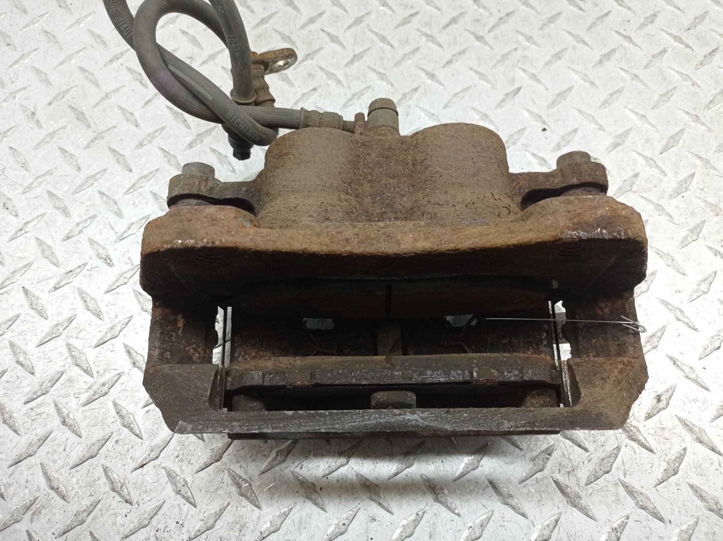 Суппорт передний левый