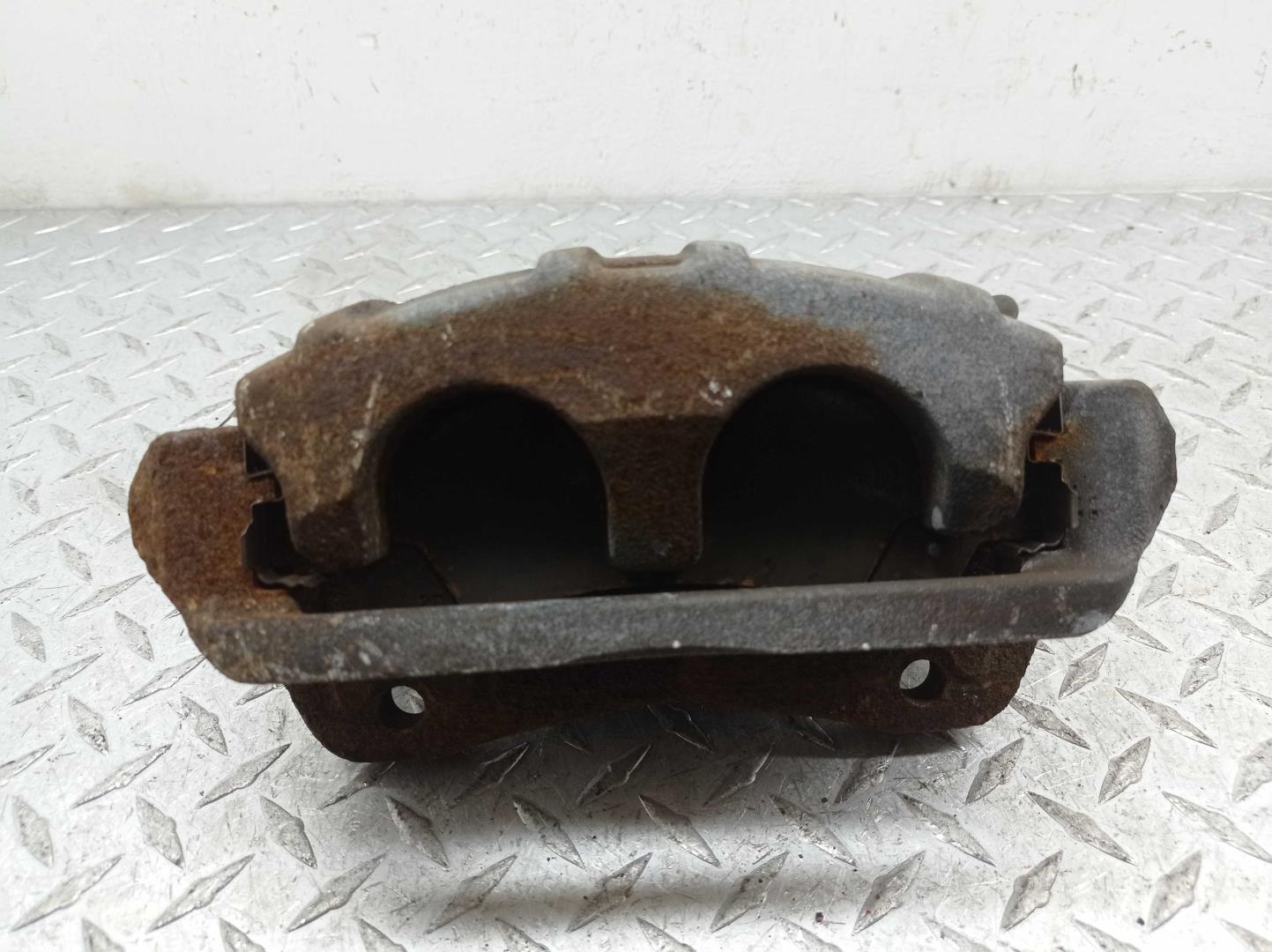 Суппорт передний левый