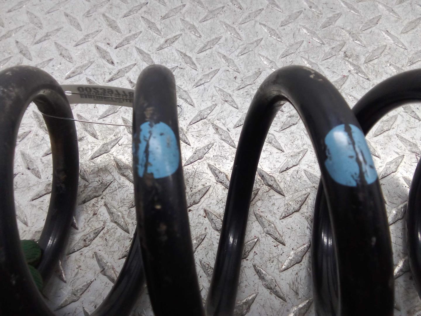 Пружина задняя