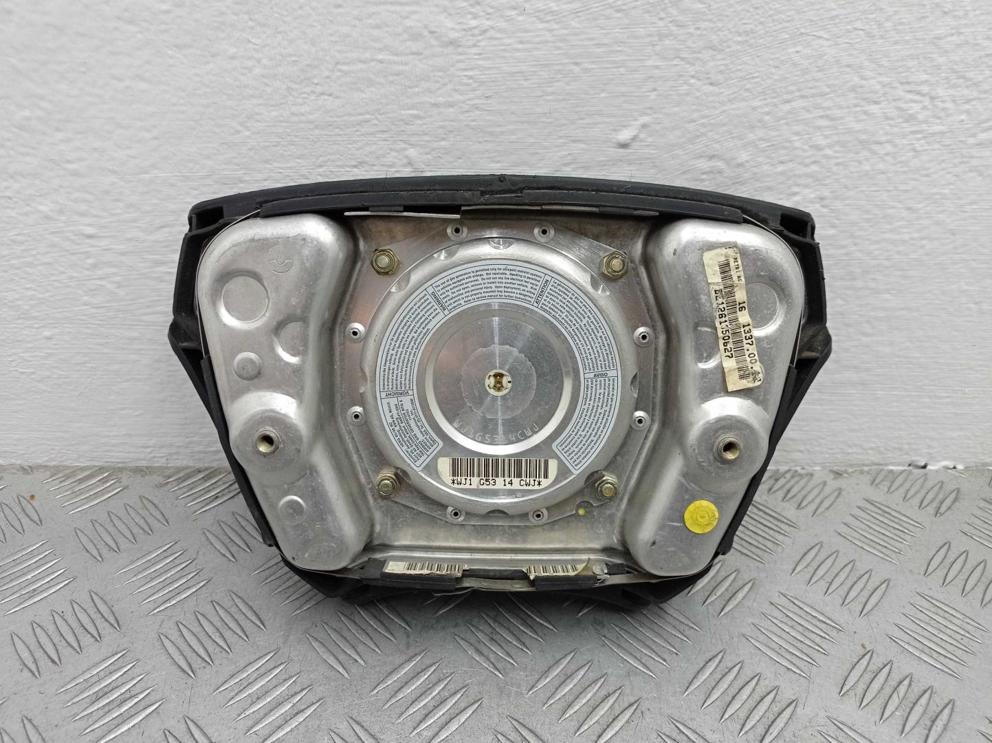 Подушка безопасности в рулевое колесо